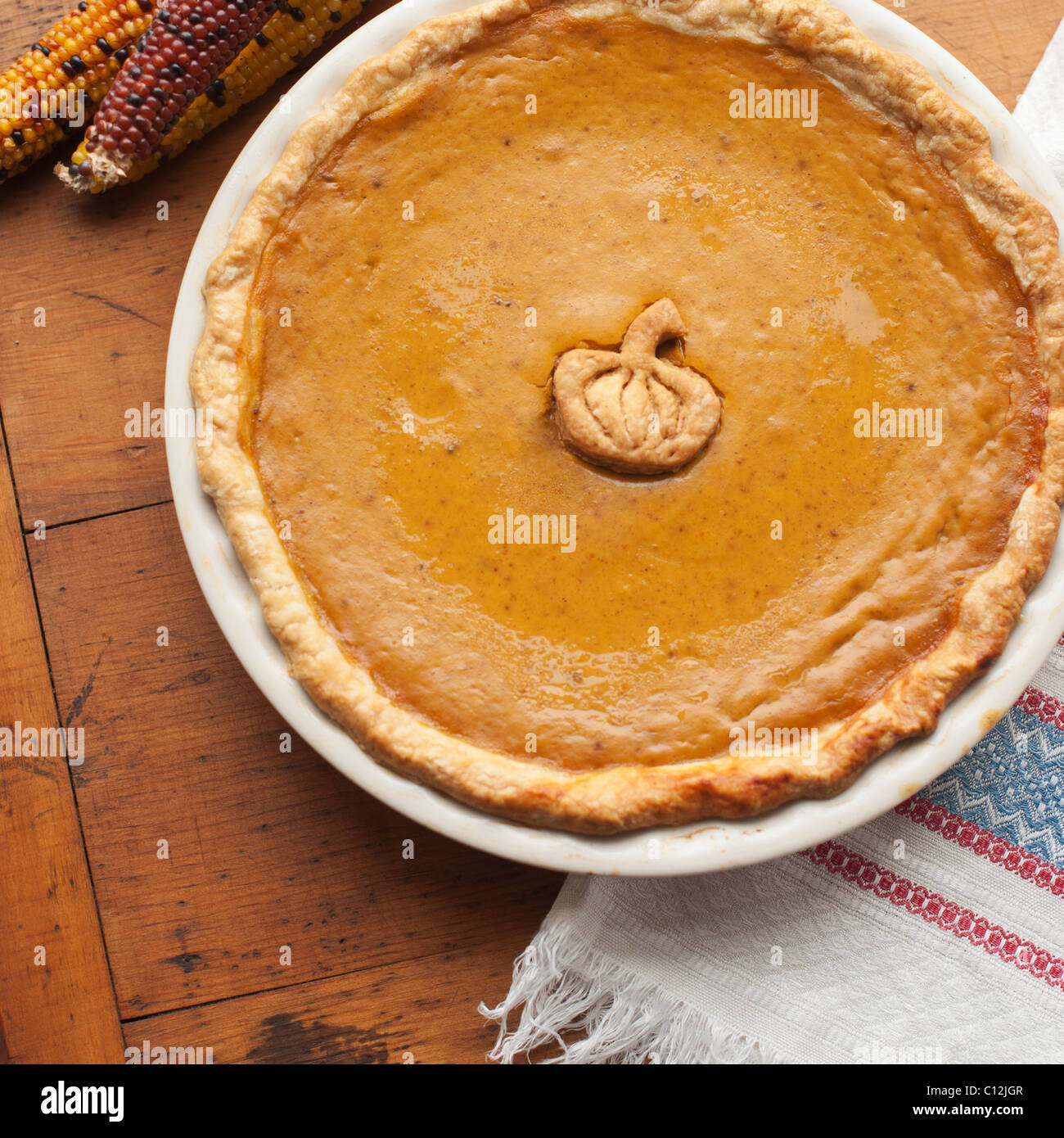Close up of pumpkin pie on table Stock Photo