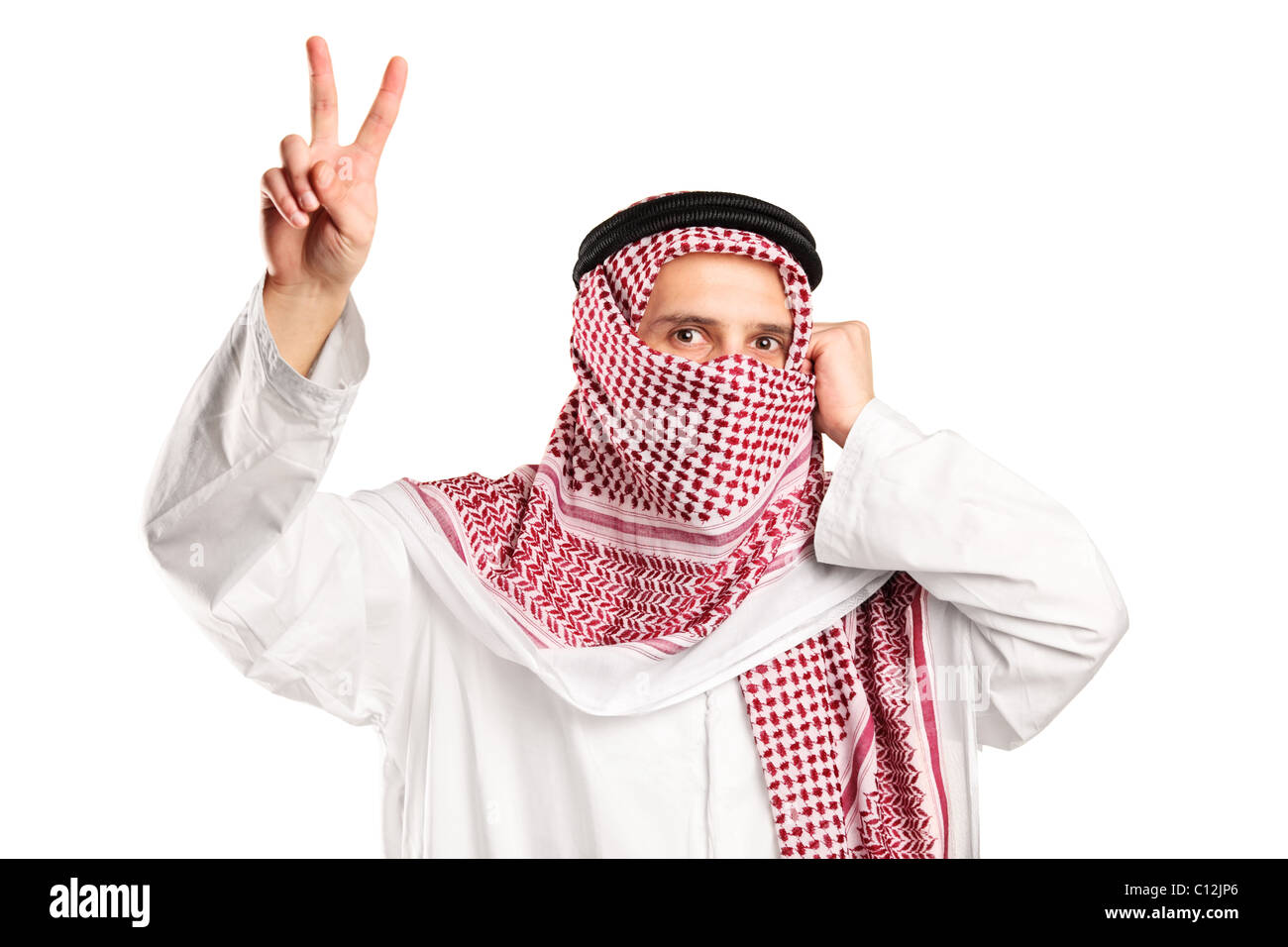 An arab man with covered face gesturing victory Stock Photo