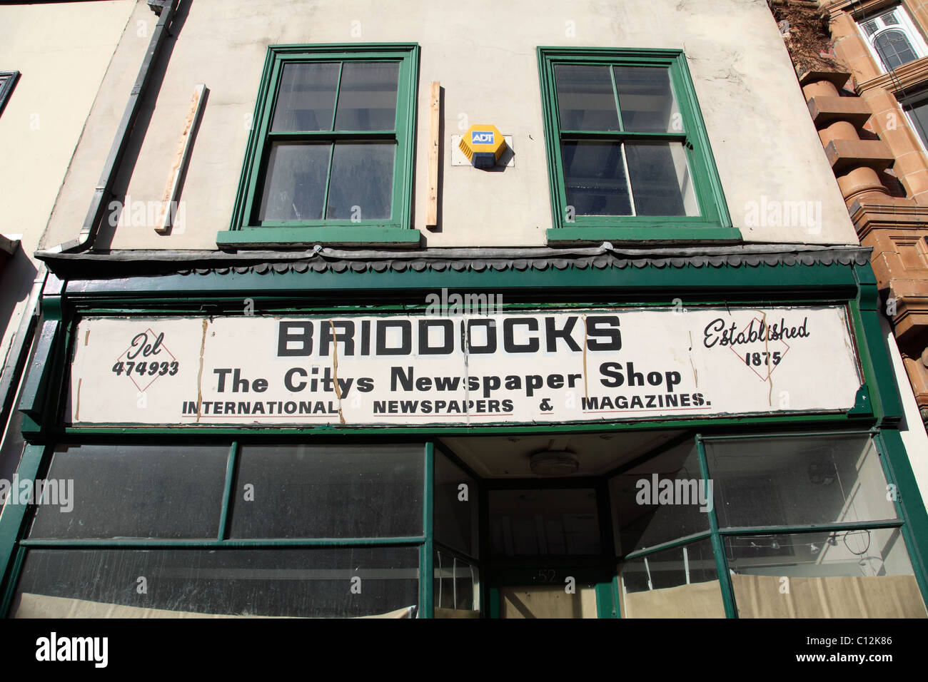 An old shop sign on a closed newsagents in Nottingham, England, U.K