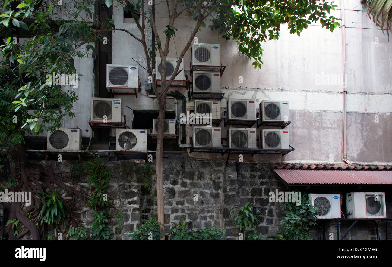 Air Conditioning Units on the side of a building in Manila Stock Photo