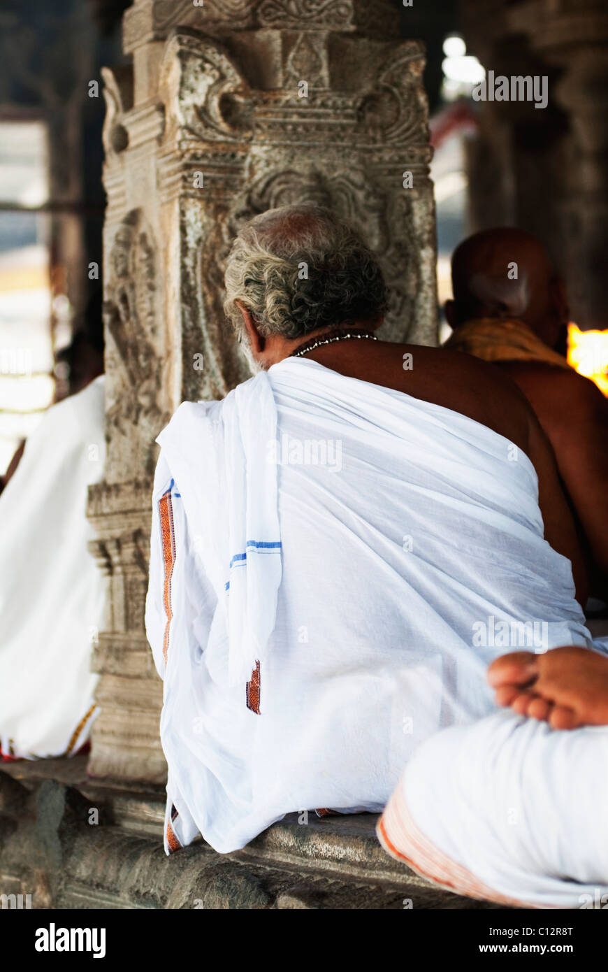 People worshipping in a temple, Kamakshi Amman Temple, Kanchipuram, Tamil Nadu, India Stock Photo
