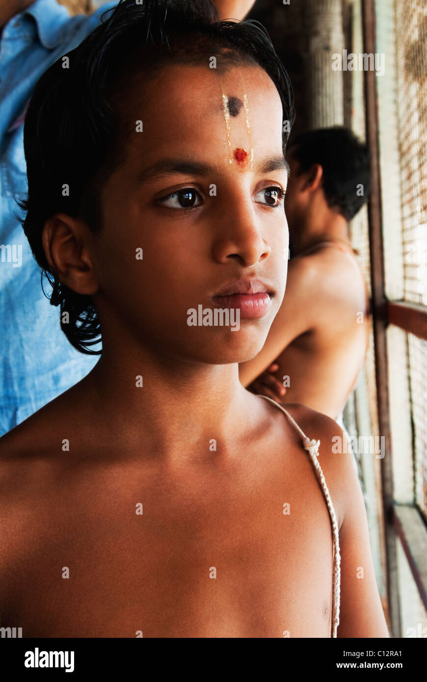 Boy in a temple, Kamakshi Amman Temple, Kanchipuram, Tamil Nadu, India