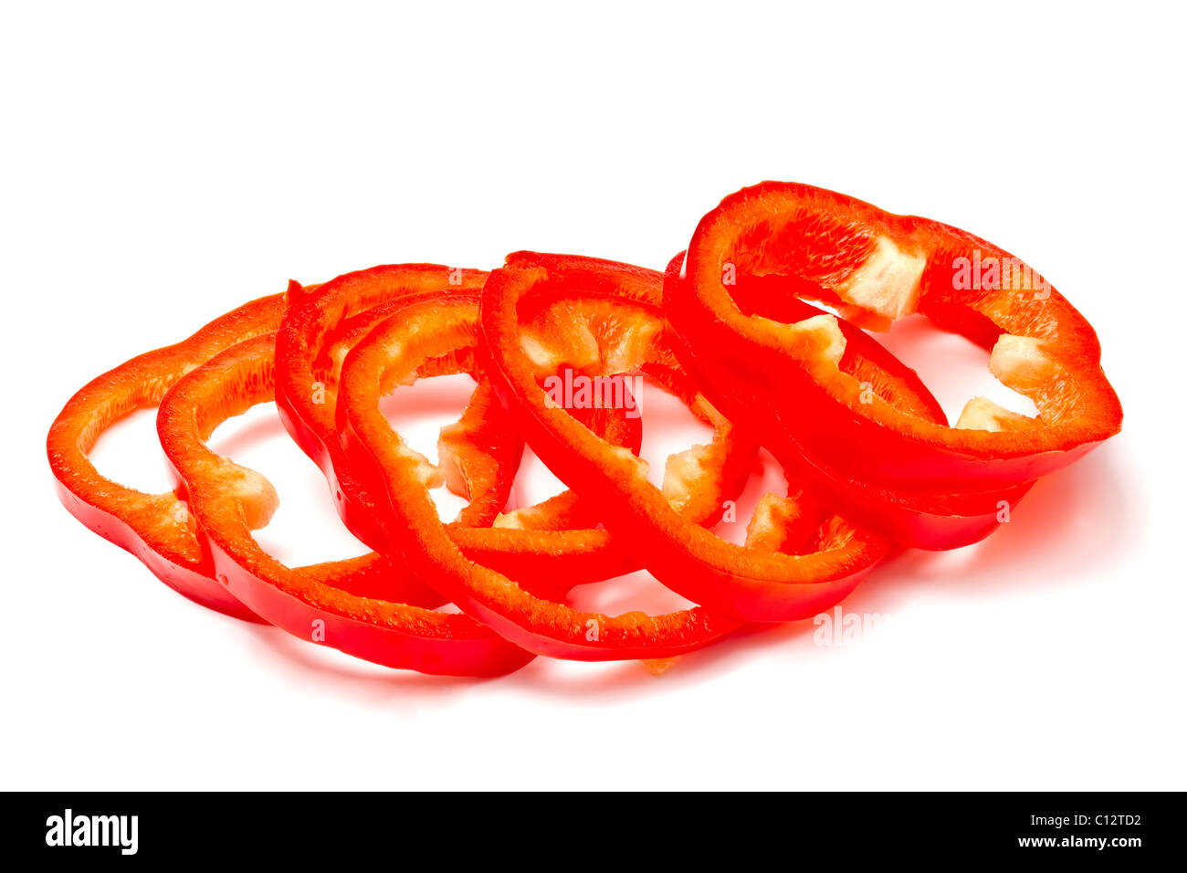 Sliced red pepper on white background Stock Photo