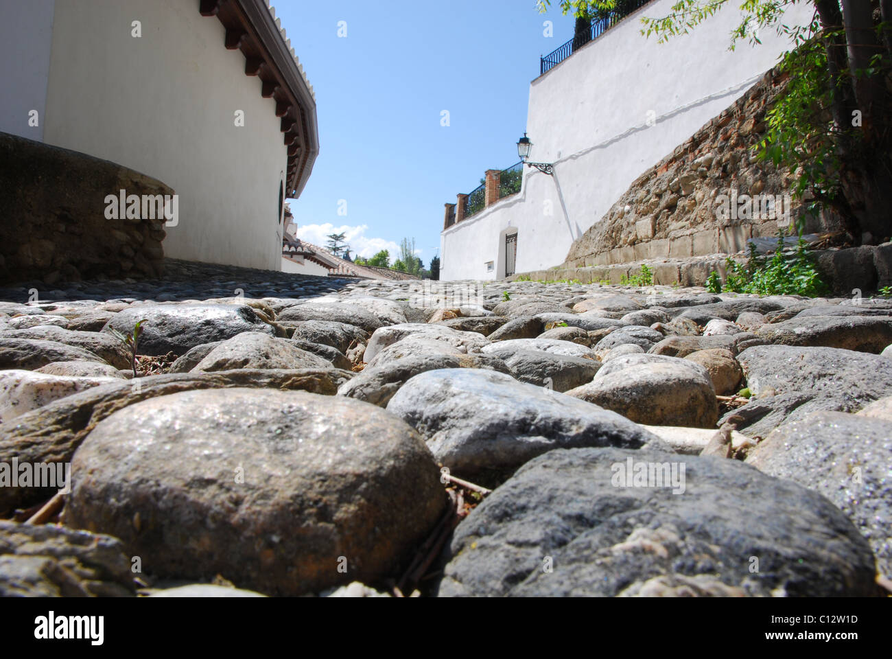 Cobbled street in Albaicin, Albayzin, Granada, Andalusia, Spain Stock Photo