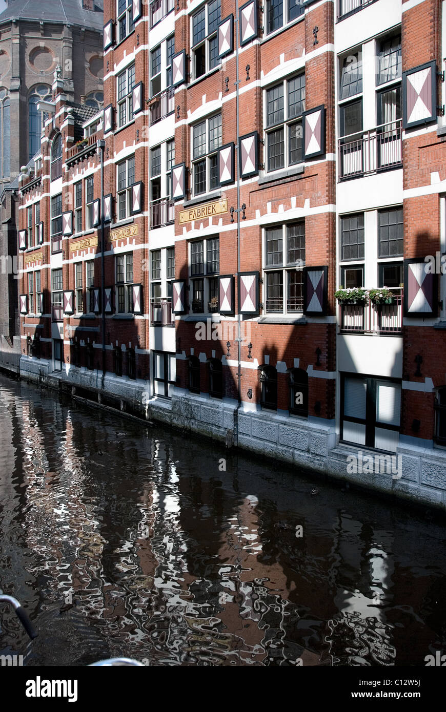 Building facades beside canal in Amsterdam, Holland Stock Photo