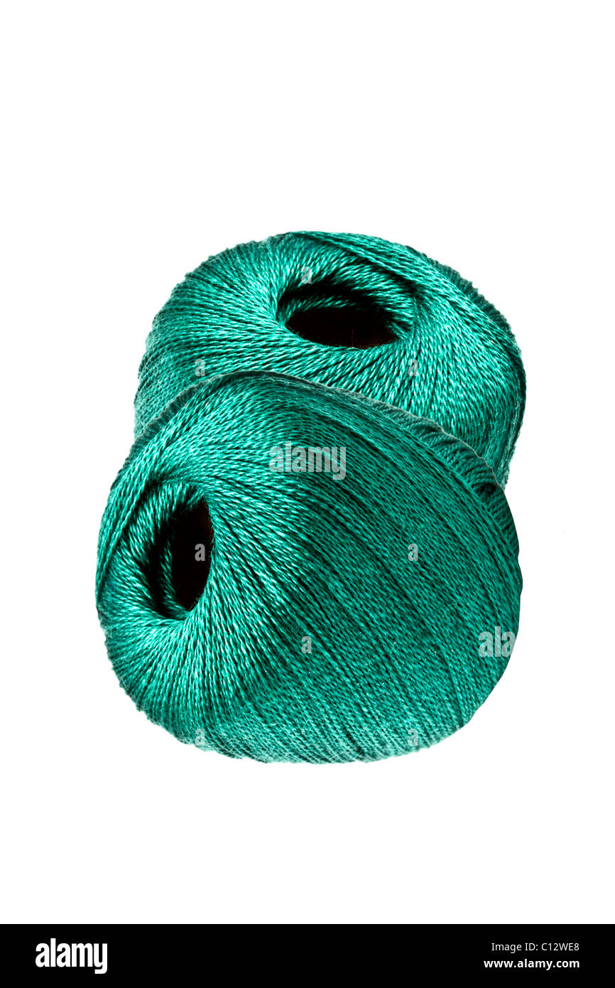 Green thread isolated on white background Stock Photo - Alamy