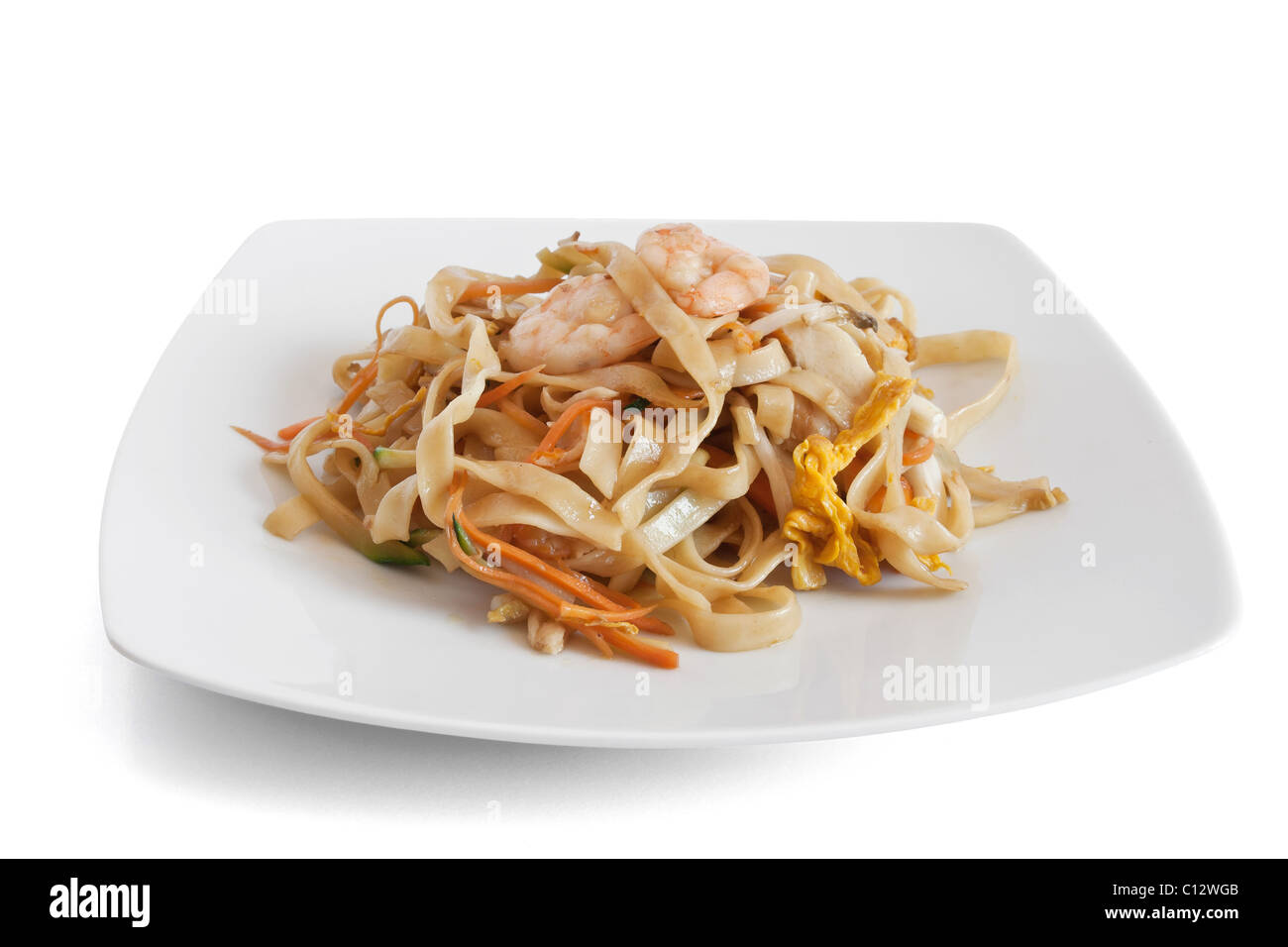 dish with noodles and seafood isolated on white with clipping path Stock Photo