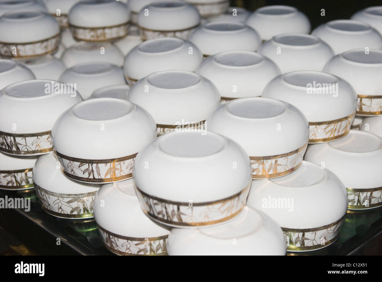 Soup bowls arranged on a table in a wedding Stock Photo