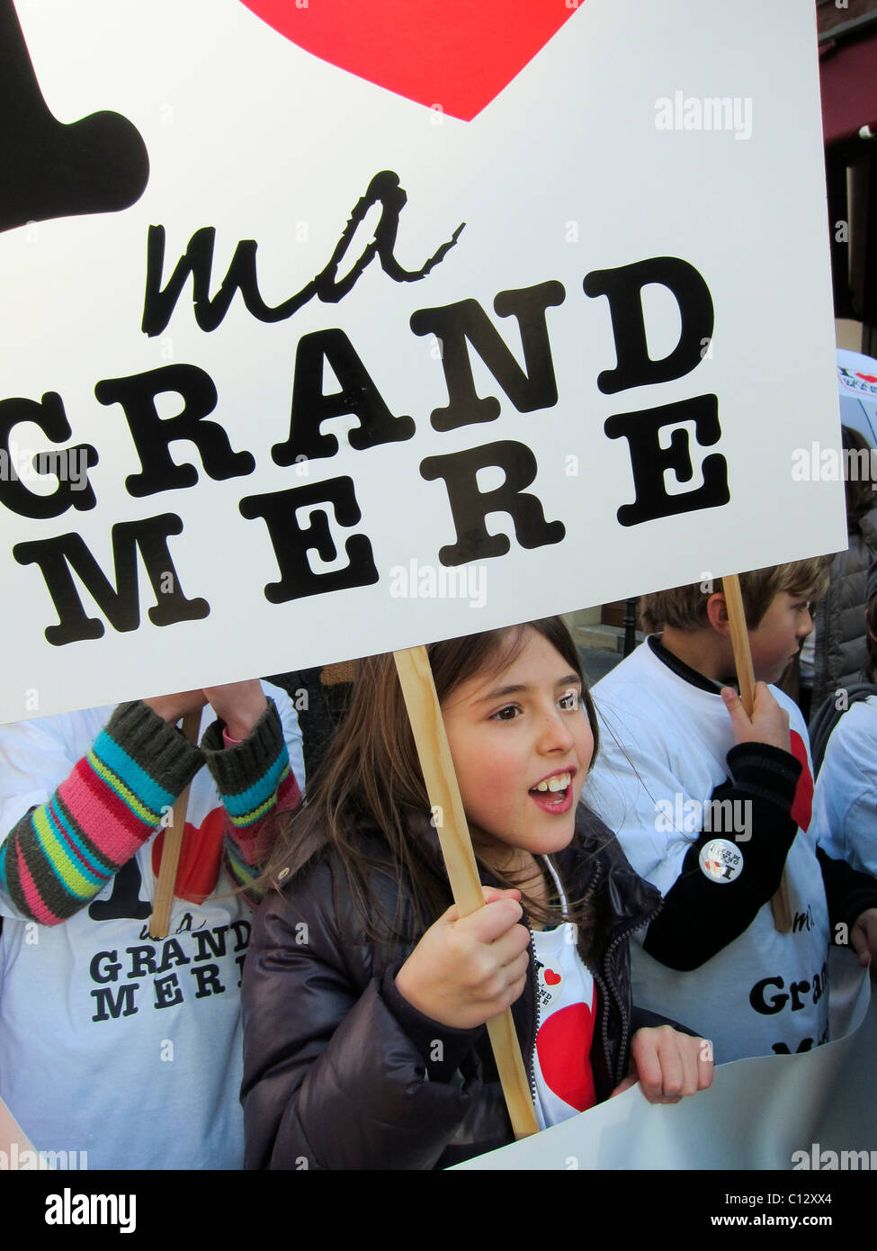 Paris, France, Children Rally in Support of Grandmothers on Grandmother's Day, Holding SIgns Stock Photo