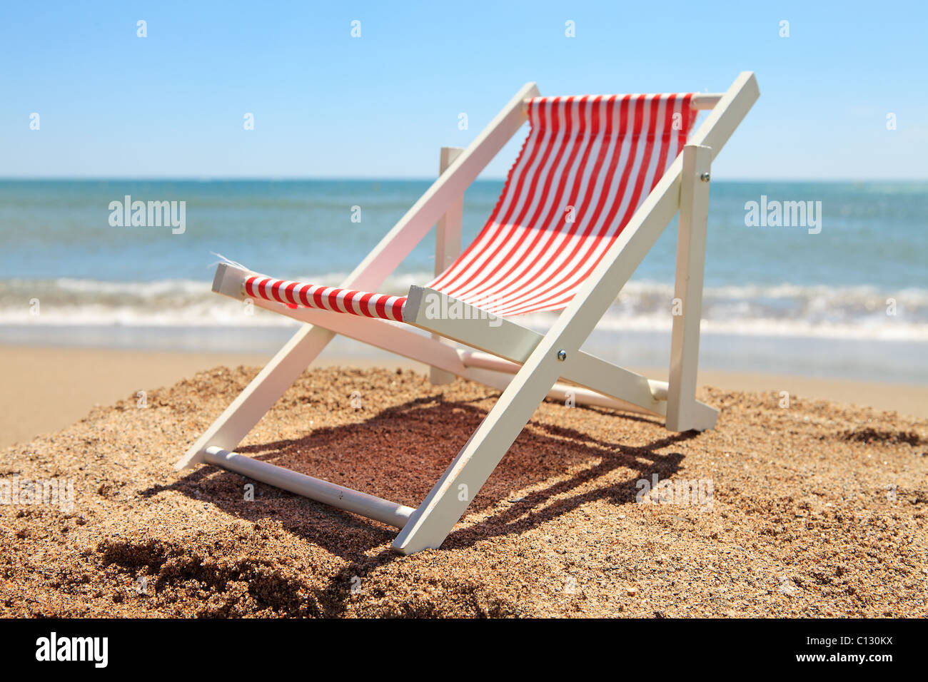 Empty chair on beach hi-res stock photography and images - Alamy