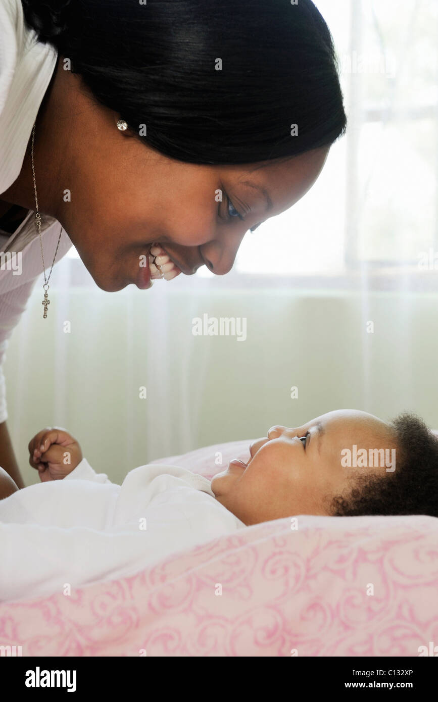 Mother & baby smiling at each other. Cape Town, South Africa Stock Photo