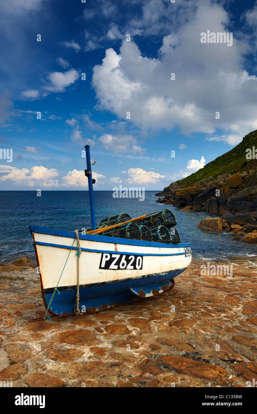 Small fishing boat resting on the slipway at Penberth Cove Stock Photo