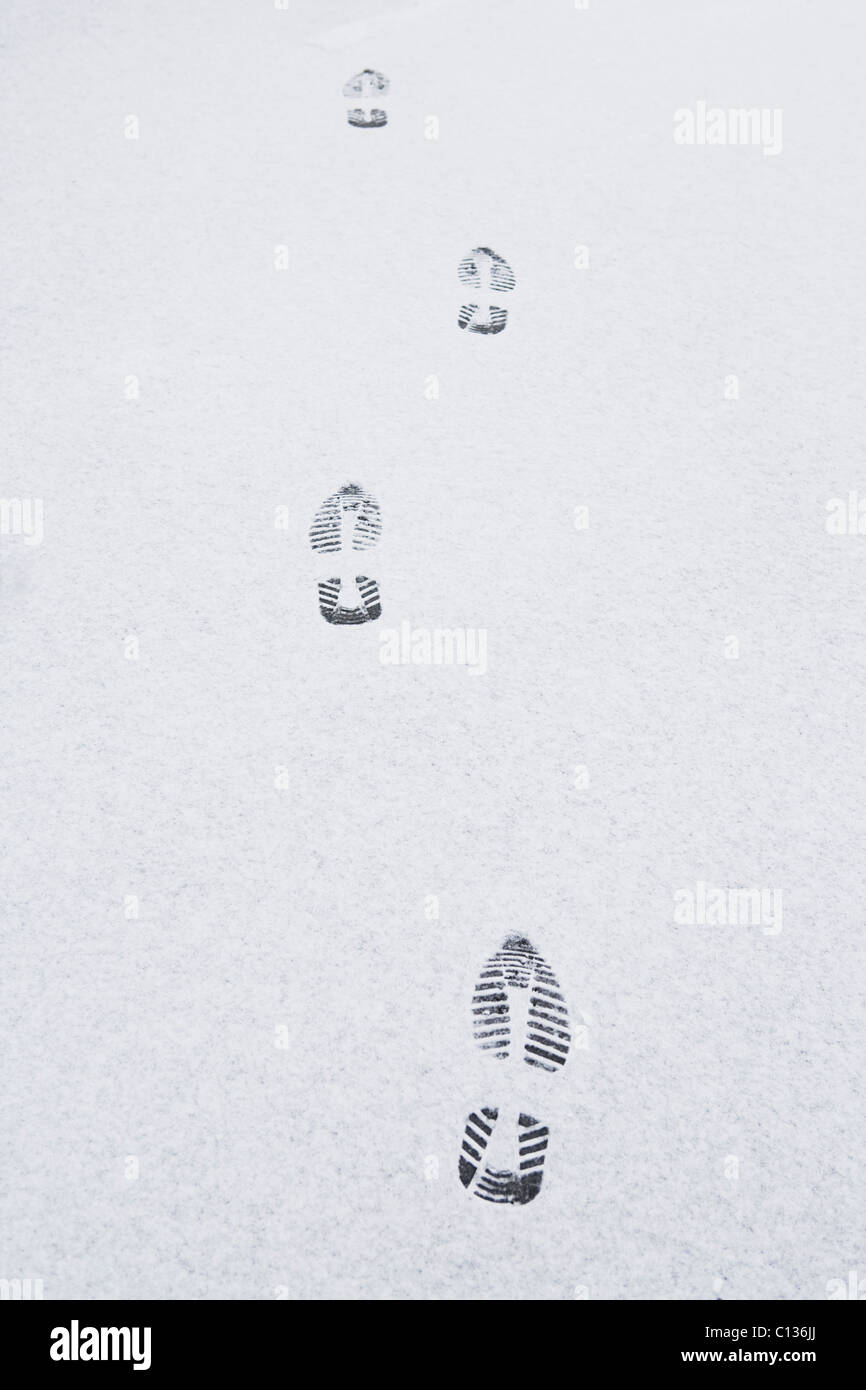 USA, New Jersey, footprints on snow Stock Photo