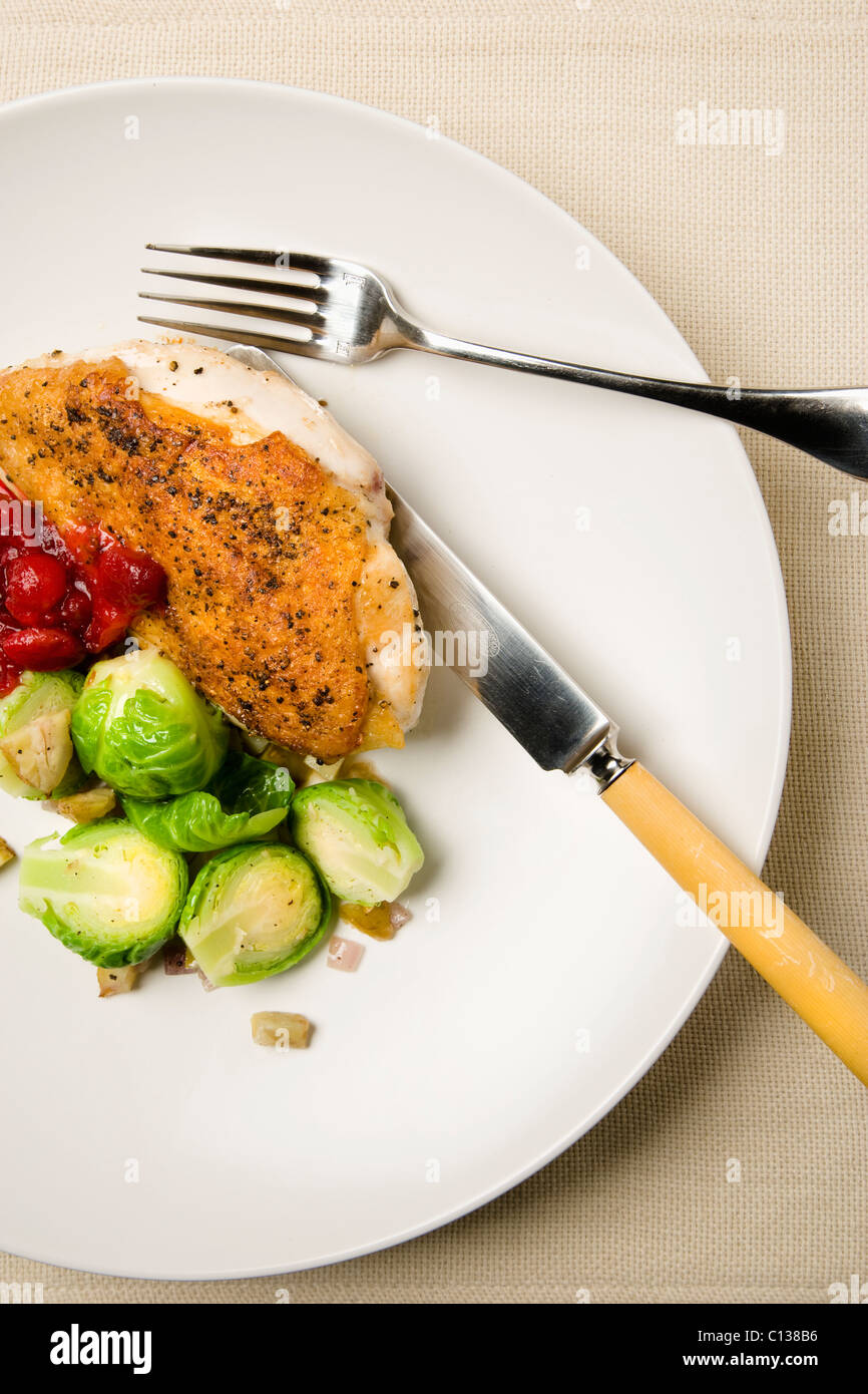 Chicken meal with brussels sprouts Stock Photo