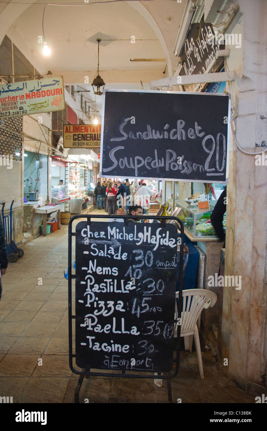 Restaurant signs inside Marche Central the central market new town Casablanca central Morocco northern Africa Stock Photo