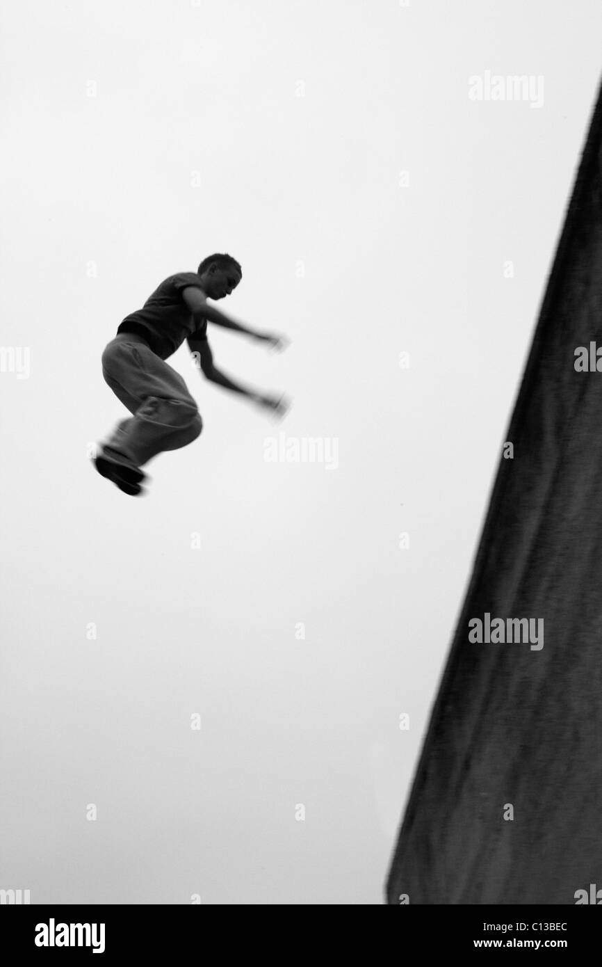 Teenage boy practicing free running Stock Photo Alamy