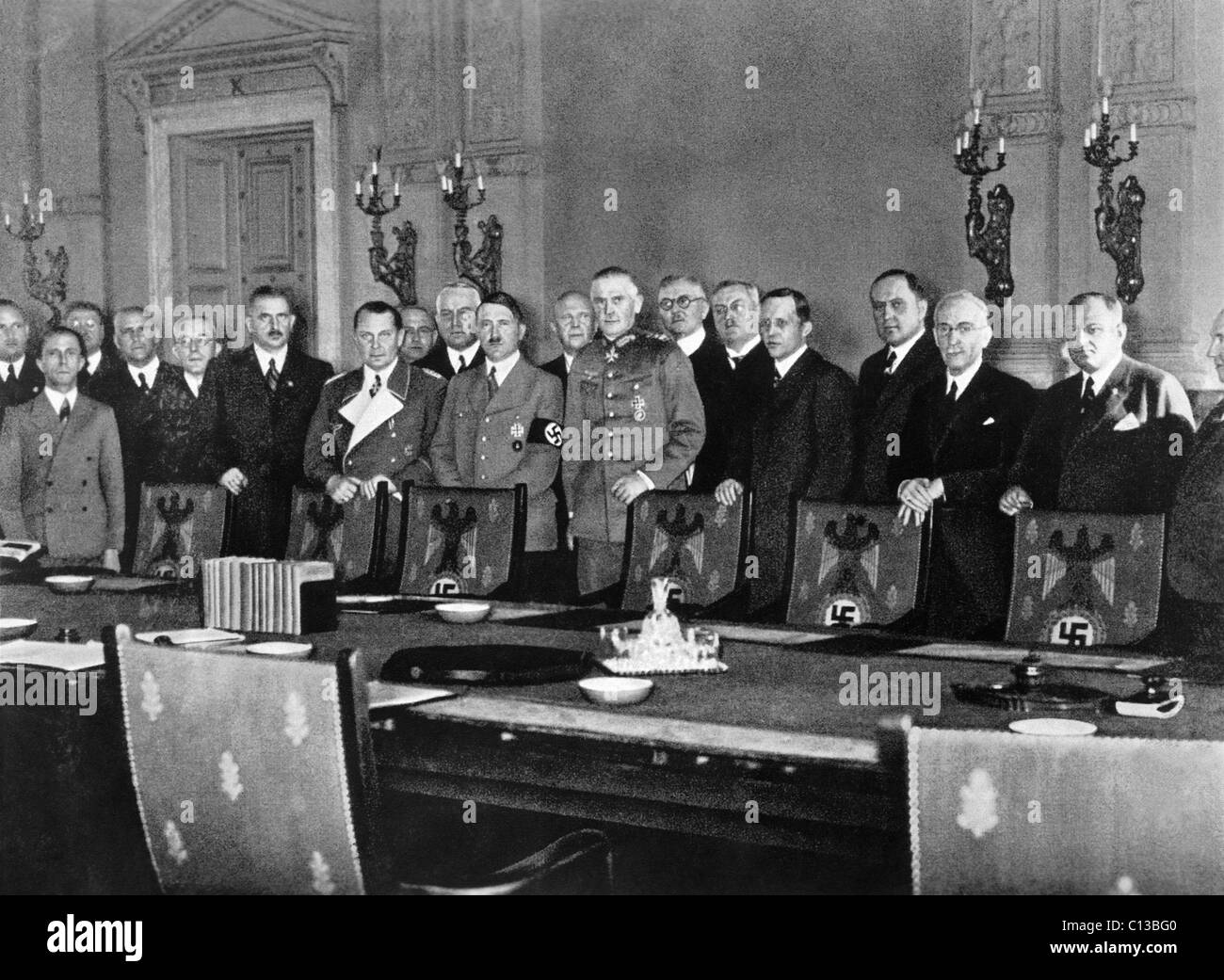 Adolf Hitler, center; Franz von Papen, right of Hitler; Hermann Goering, (white lapels); Joseph Goebbels, left front, 1933 Stock Photo