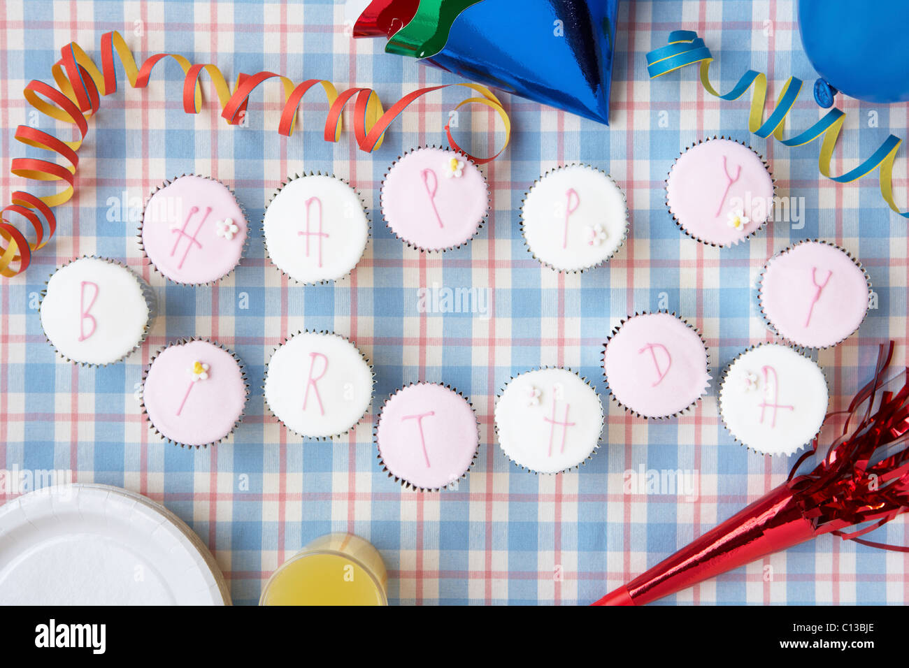 Cupcakes spell out happy birthday Stock Photo