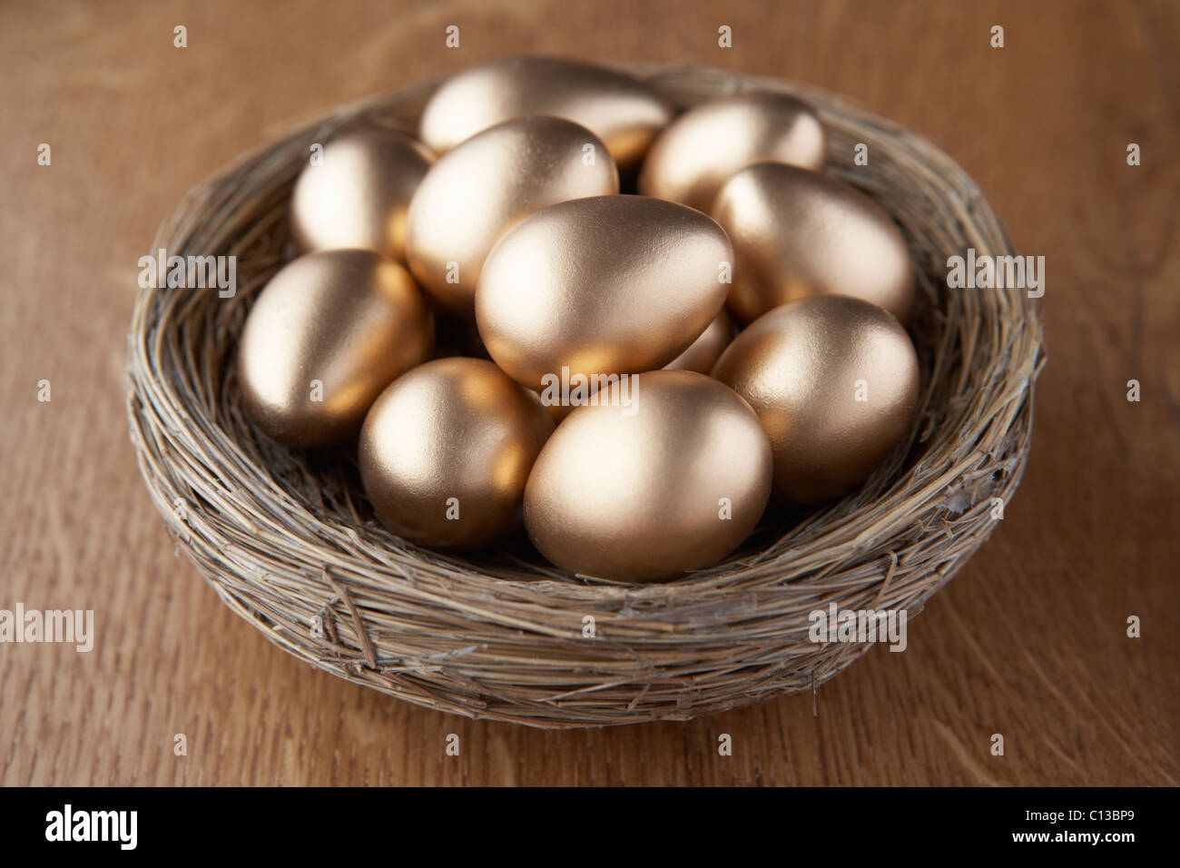 A basket of golden eggs Stock Photo
