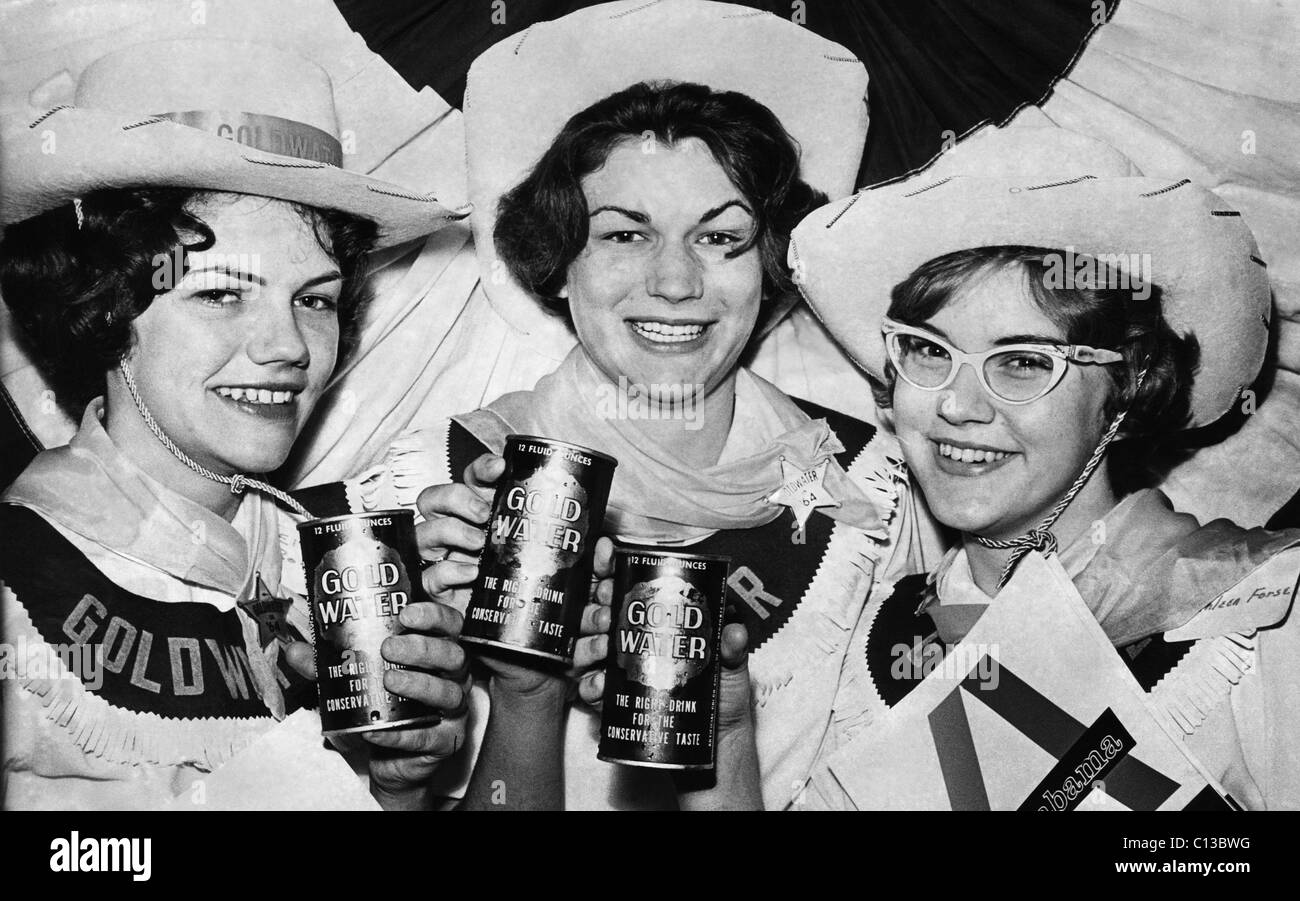 US Elections. From left: Ellen Robinson, Marylee Becraft and Kathlee Forse displaying cans of 'Gold Water' in support of US Senator and Republican Party presidential nominee Barry Goldwater at the Replublican National Convention in San Francisco, California, July, 1964. Stock Photo
