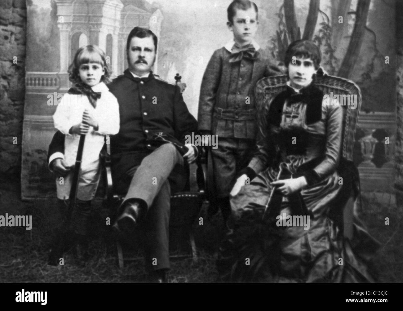From left: Douglas MacArthur at 5, his father Arthur MacArthur Jr, his brother Arthur MacArthur III, his mother Mary Pinkney MacArthur, 1885 Stock Photo
