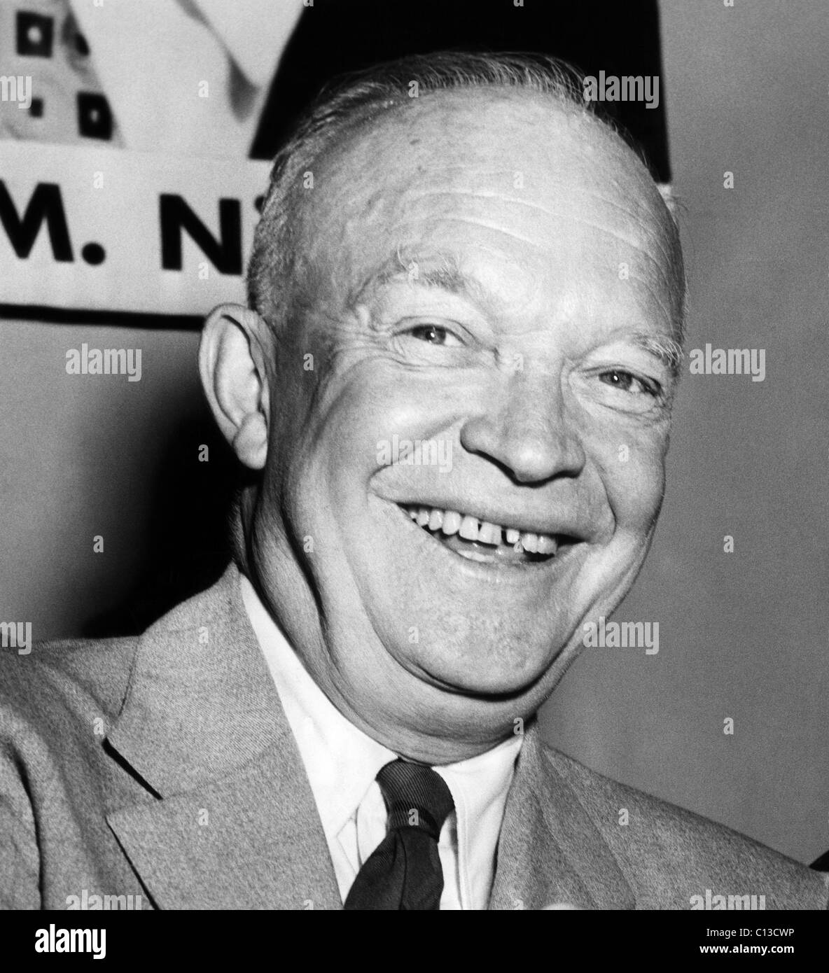 Presidential candidate Dwight D. Eisenhower showing a vacant spot where a cap had fallen off one of his front teeth. 9/8/52. Stock Photo