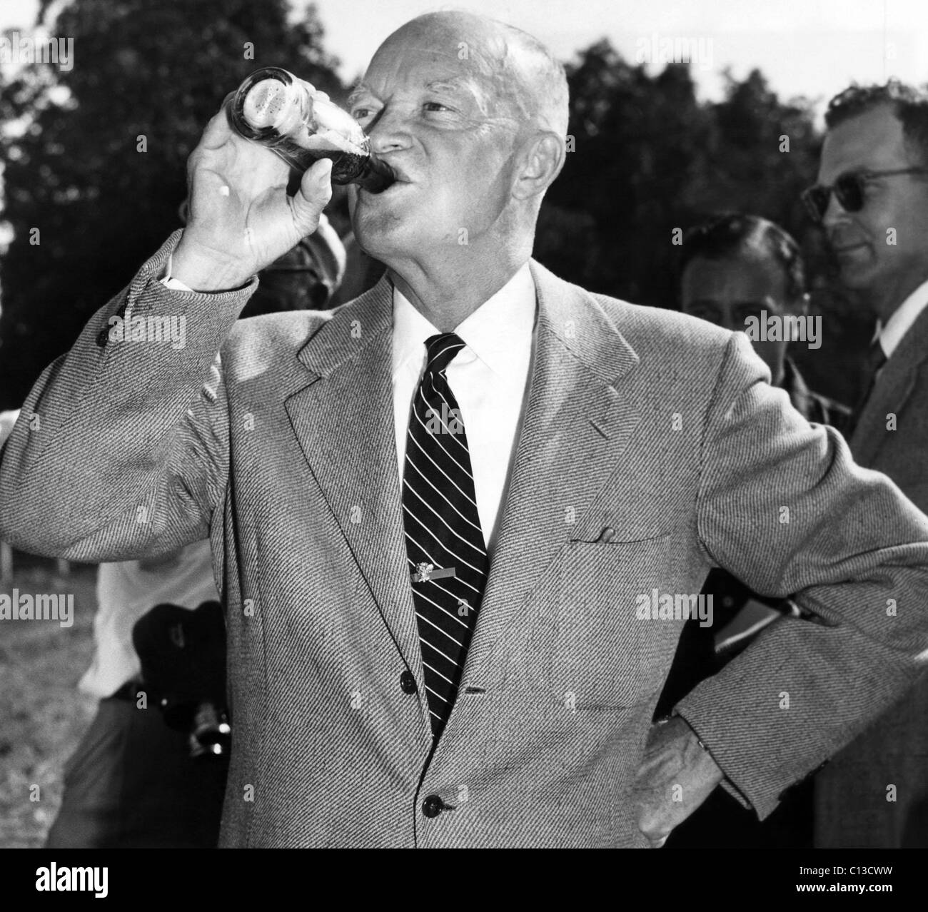 President Dwight D. Eisenhower downing a soft drink. 9/13/53. Stock Photo