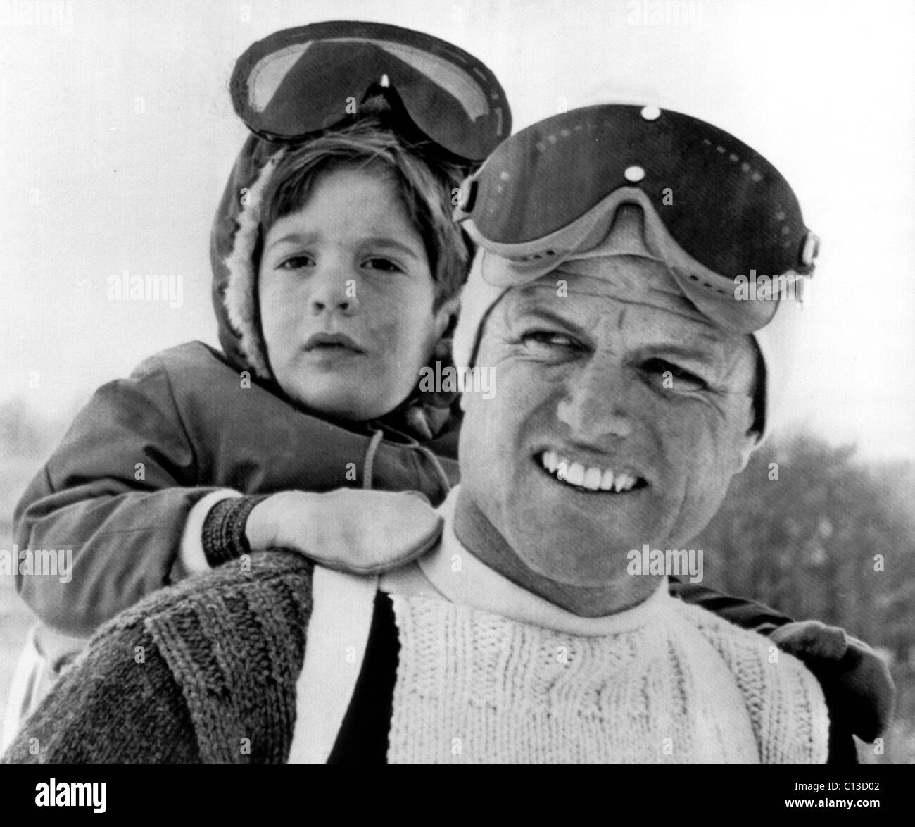 Edward Kennedy and nephew John F. Kennedy Jr. on the ski slopes, 3/29/64 Stock Photo