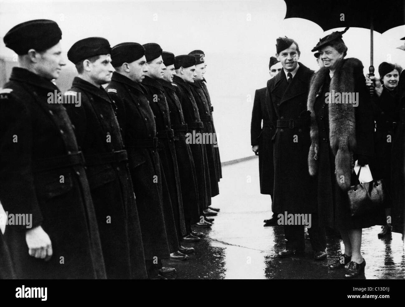 World War II. First Lady Eleanor Roosevelt reviews British and American ferry pilots at an Air Transport Auxiliary airfield, Great Britain, 1943. Stock Photo