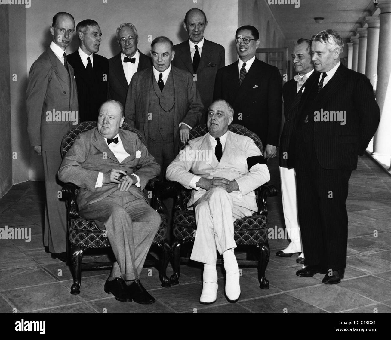 World War II. Seated, from left: British Prime Minister Winston Churchill, US President Franklin Delano Roosevelt. Standing, from left: Eelco Van Kleffens, Owen Dixon, Leighton McCarthy, W.L. Mackenzie King, E.F.L. Wood, T.V. Soong, Manuel Quezon, Walter Nash, Pacific War Council, White House, Washington, D.C., 1942. Stock Photo