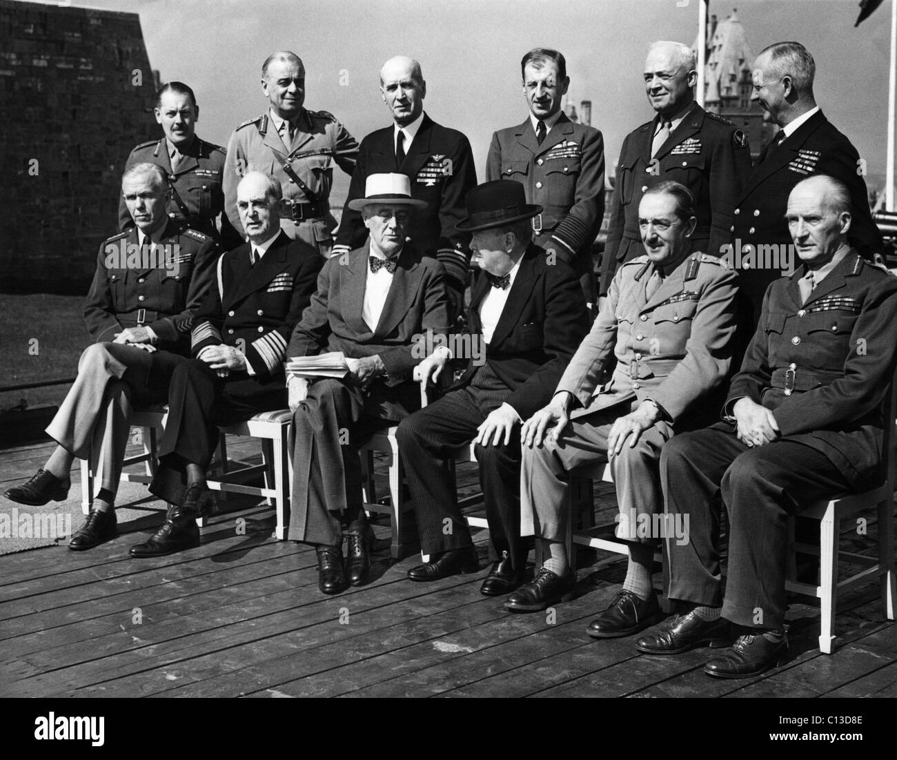 World War II. Seated, from left: George Marshall, William Leahy, Franklin Delano Roosevelt, Winston Churchill, Alan Brooke, John Dill. Standing, from left: Roger Hollis, Hastings Ismay, Ernest King, Charles Portal, Henry Arnold, Andrew Cunningham, at the Second Quebec Conference, (codenamed OCTAGON), Quebec City, Canada, September 1944. Stock Photo