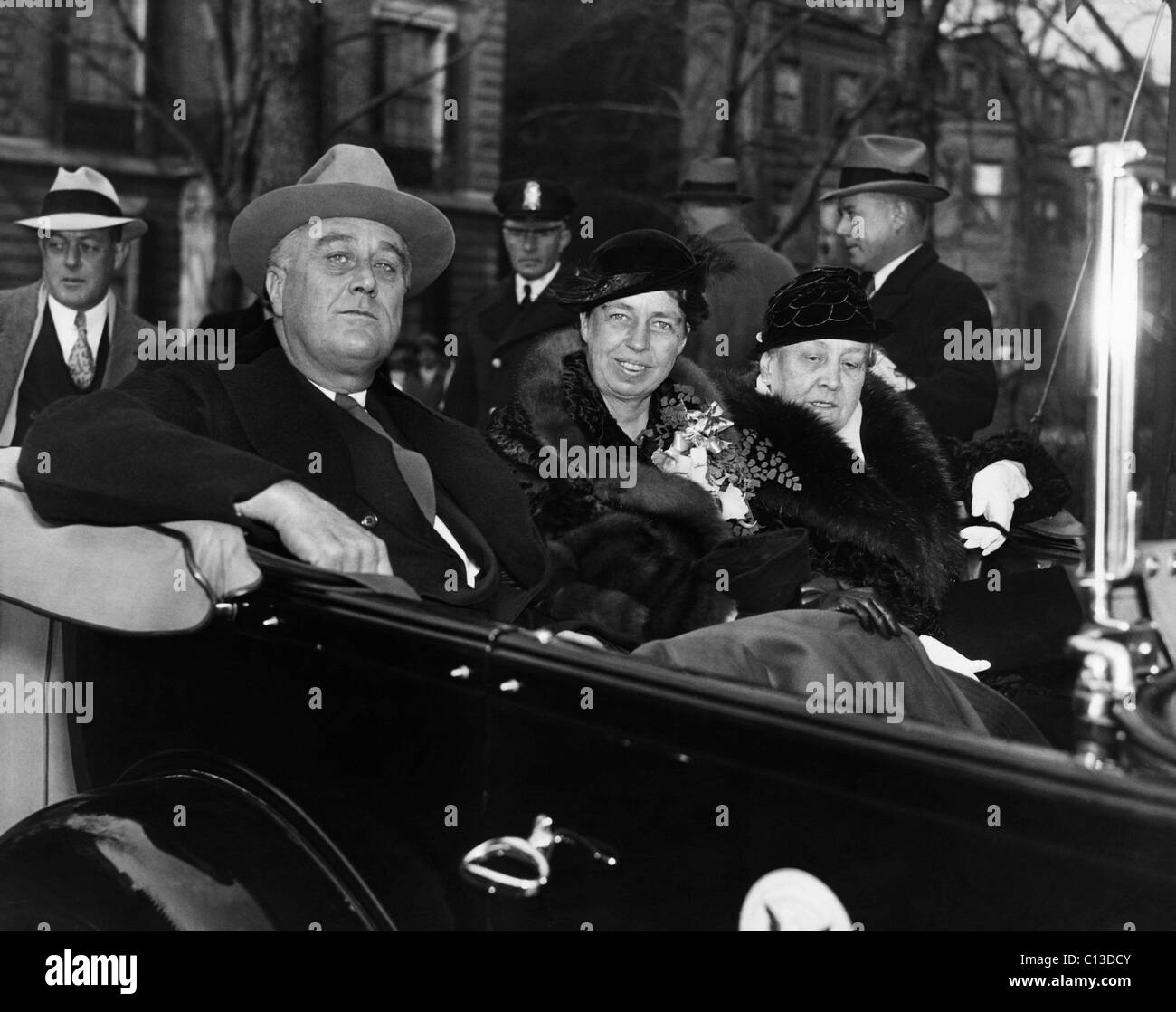 FDR Presidency. From left: US President Franklin Delano Roosevelt, First Lady Eleanor Roosevelt, Sara Roosevelt, en route to Christmas Day services, December 25, 1934. Stock Photo