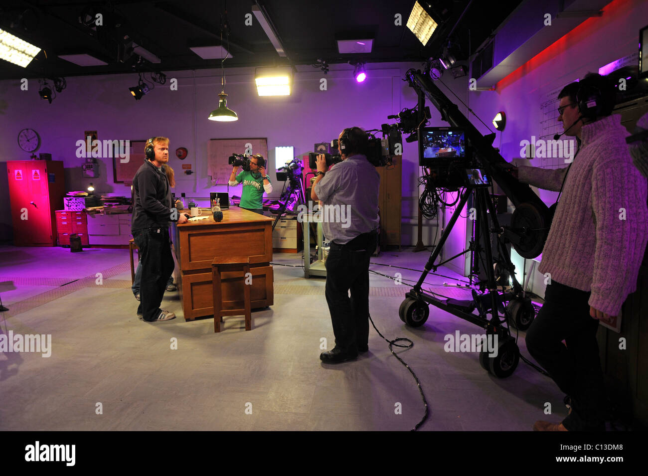 Bang Goes the Theory crew getting ready to film in their new location in a bunker at Sussex University Stock Photo