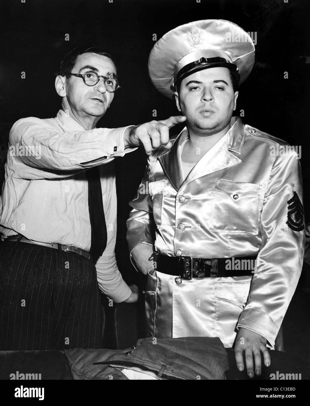 Irving Berlin and Staff Sergeant Ezra Stone watch Broadway performance of 'This Is The Army', New York, NY, 07-04-1942. Stock Photo