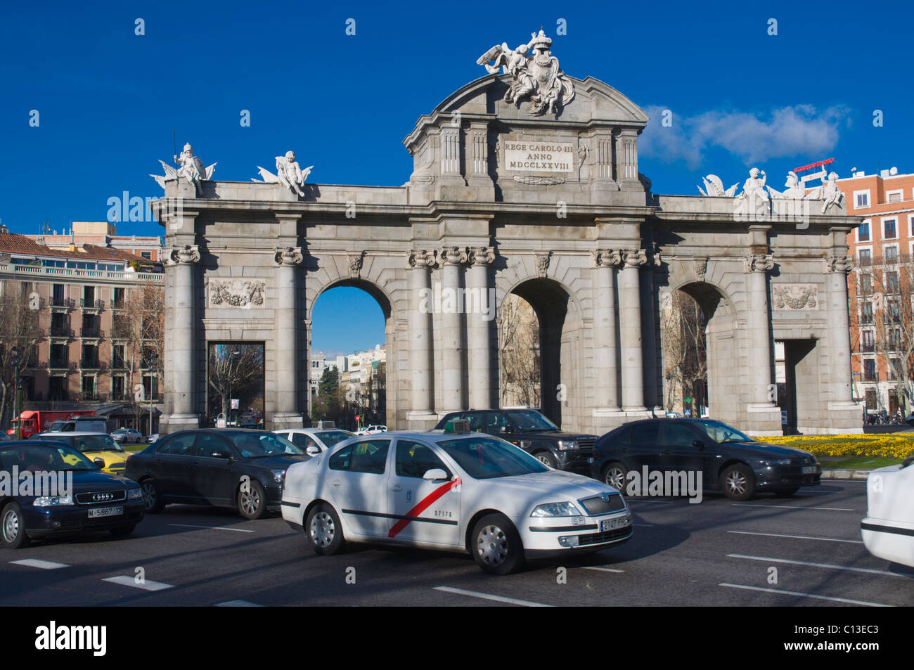Traffic at Plaza de la Independencia square roundabout central Madrid Spain Europe Stock Photo