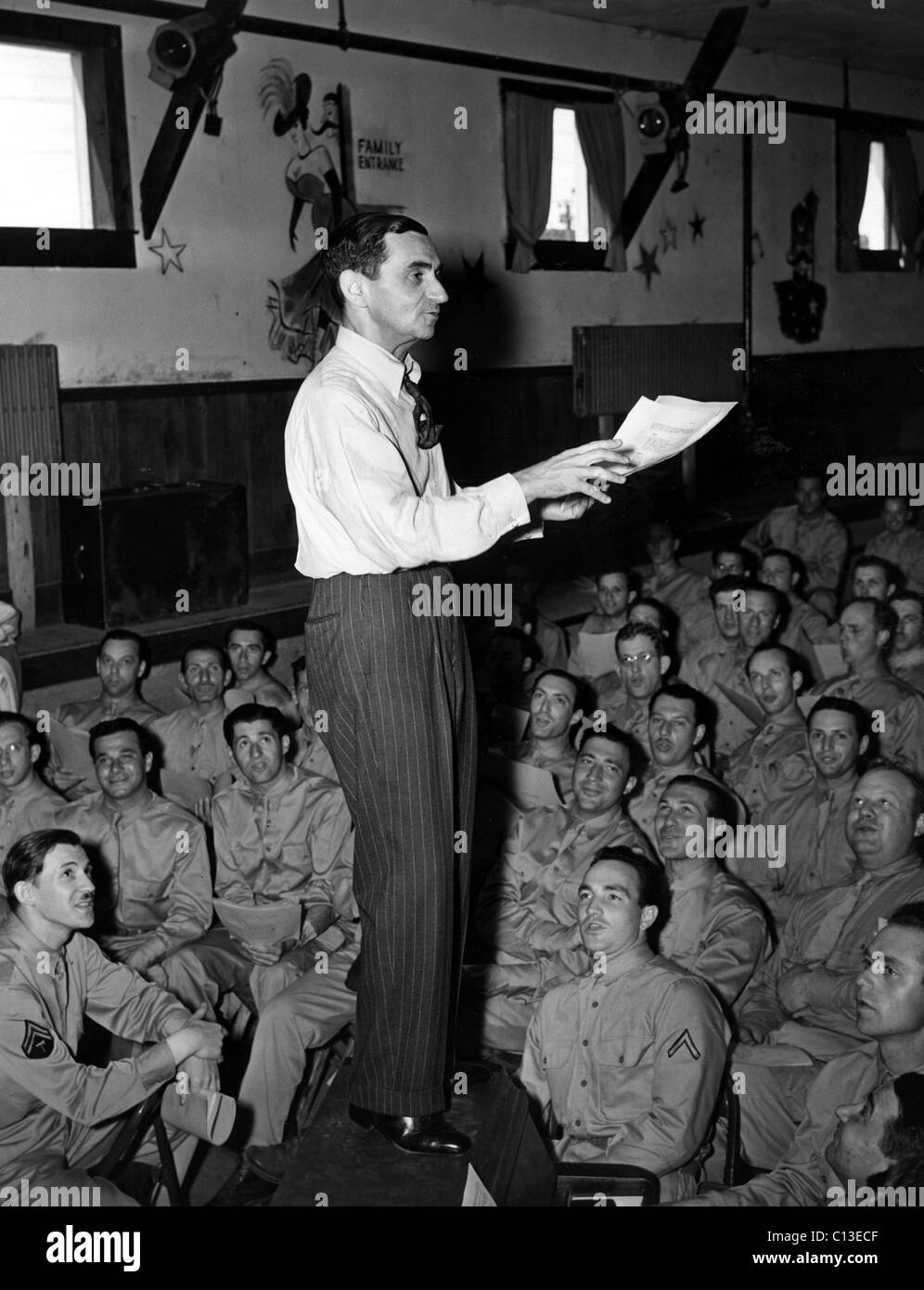 THIS IS THE ARMY, Irving Berlin rehearses with chorus, Camp Upton, NY, 5/21/1942 Stock Photo