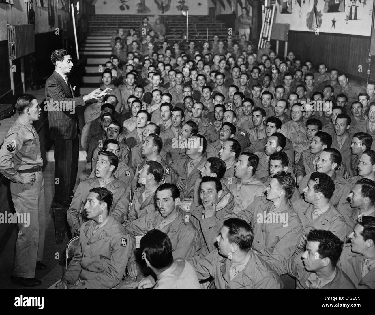 THIS IS THE ARMY, Irving Berlin rehearses with chorus, Camp Upton, NY, 6/9/1942 Stock Photo
