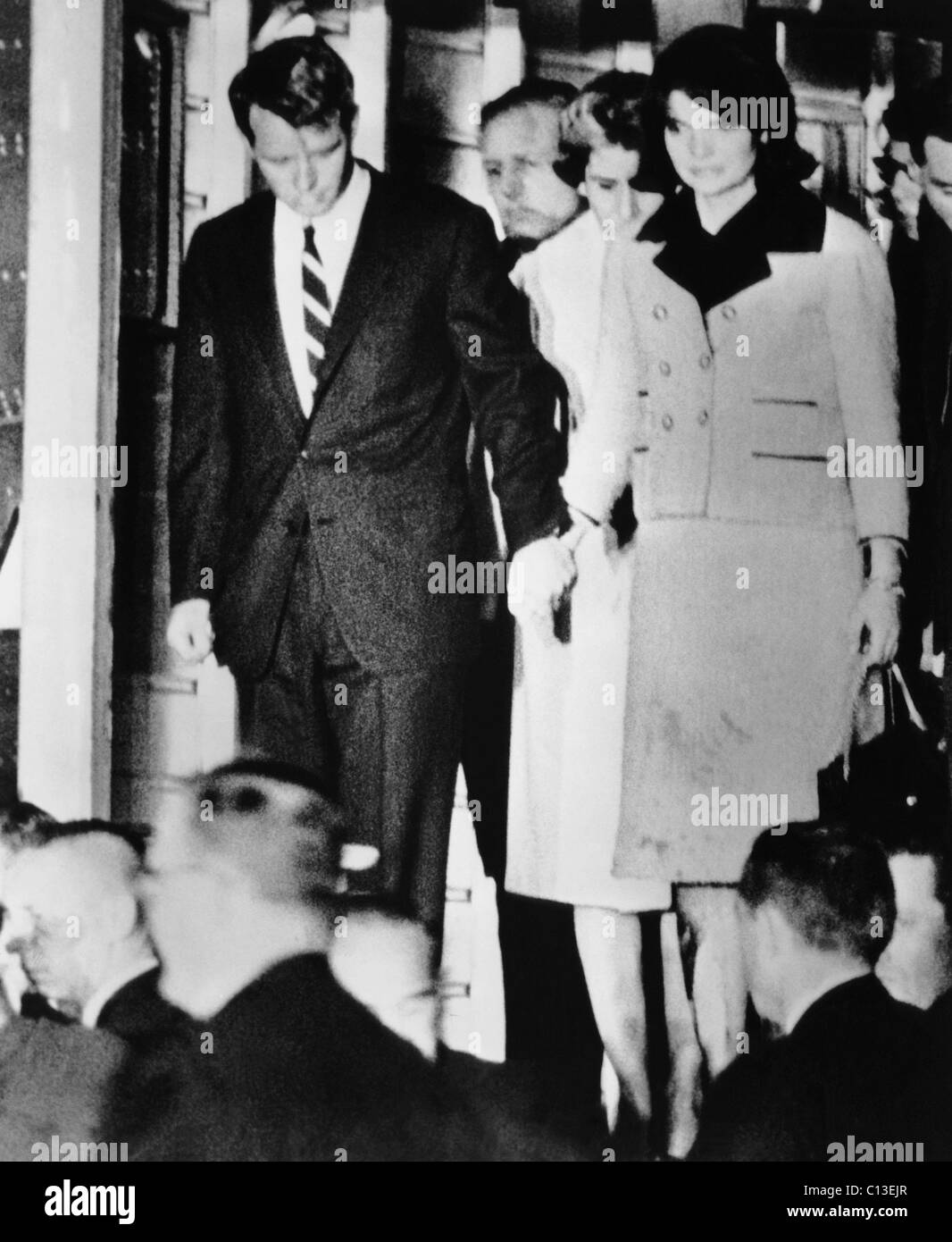 From left, Robert Kennedy, Jacqueline Kennedy, after the asassination of President John Kennedy, November 22, 1963 Stock Photo