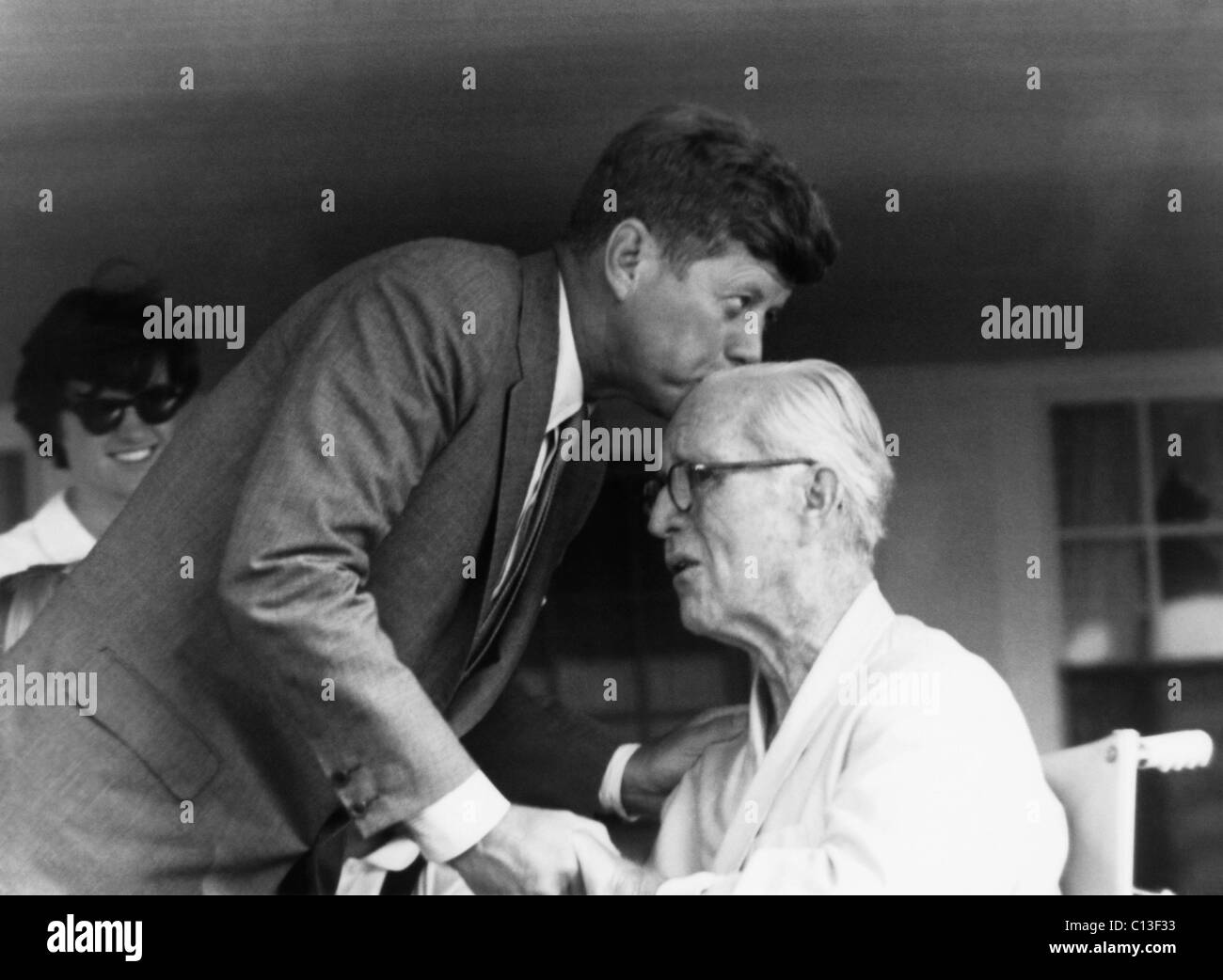 President John F. Kennedy kissing his father, Joseph Kennedy, August 15, 1963 Stock Photo