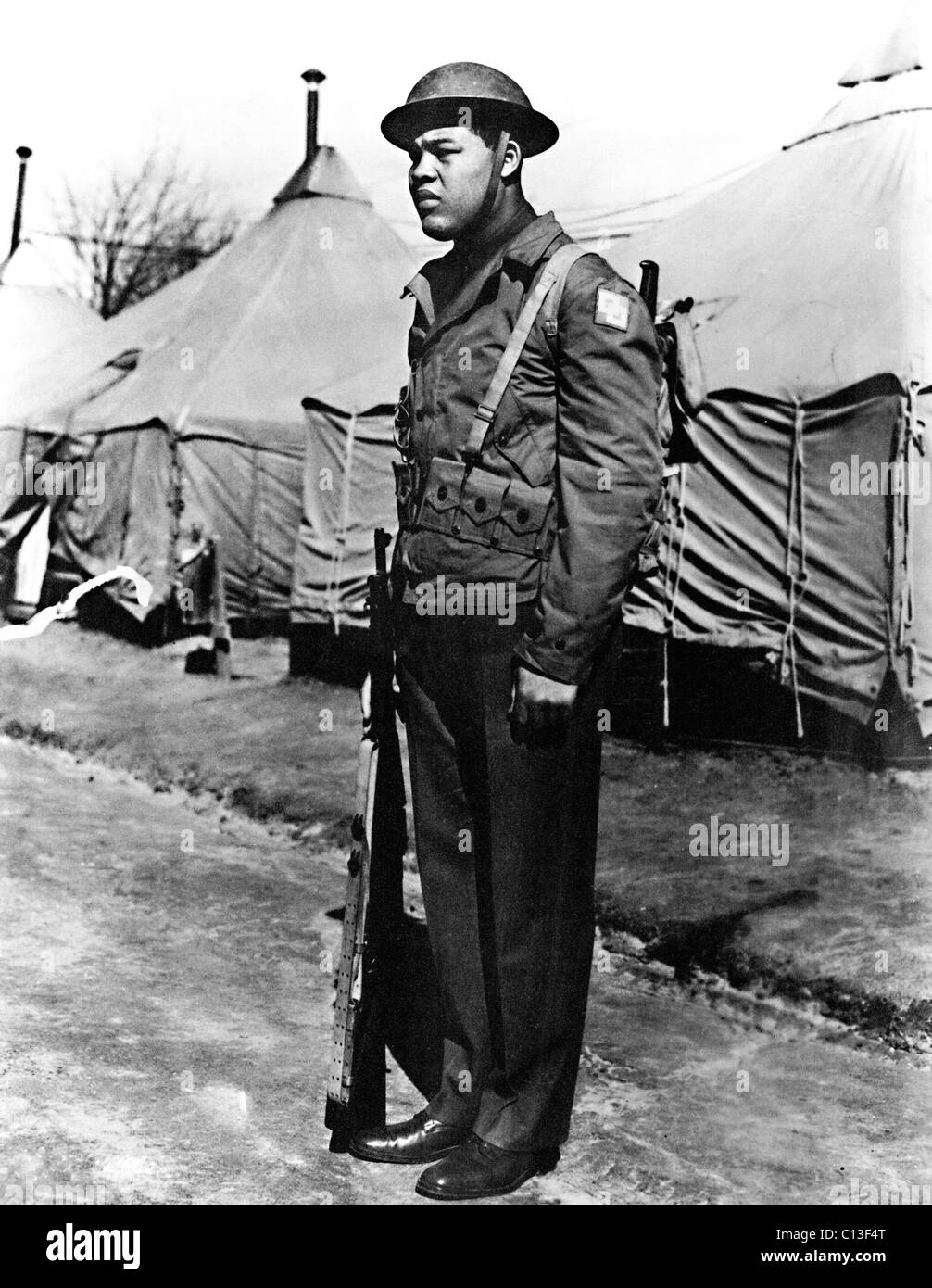 JOE LOUIS, boxing champ becomes a Sergeant in WWII,  circa 1943.  Documentary called, 'The Real Joe Louis.' Stock Photo