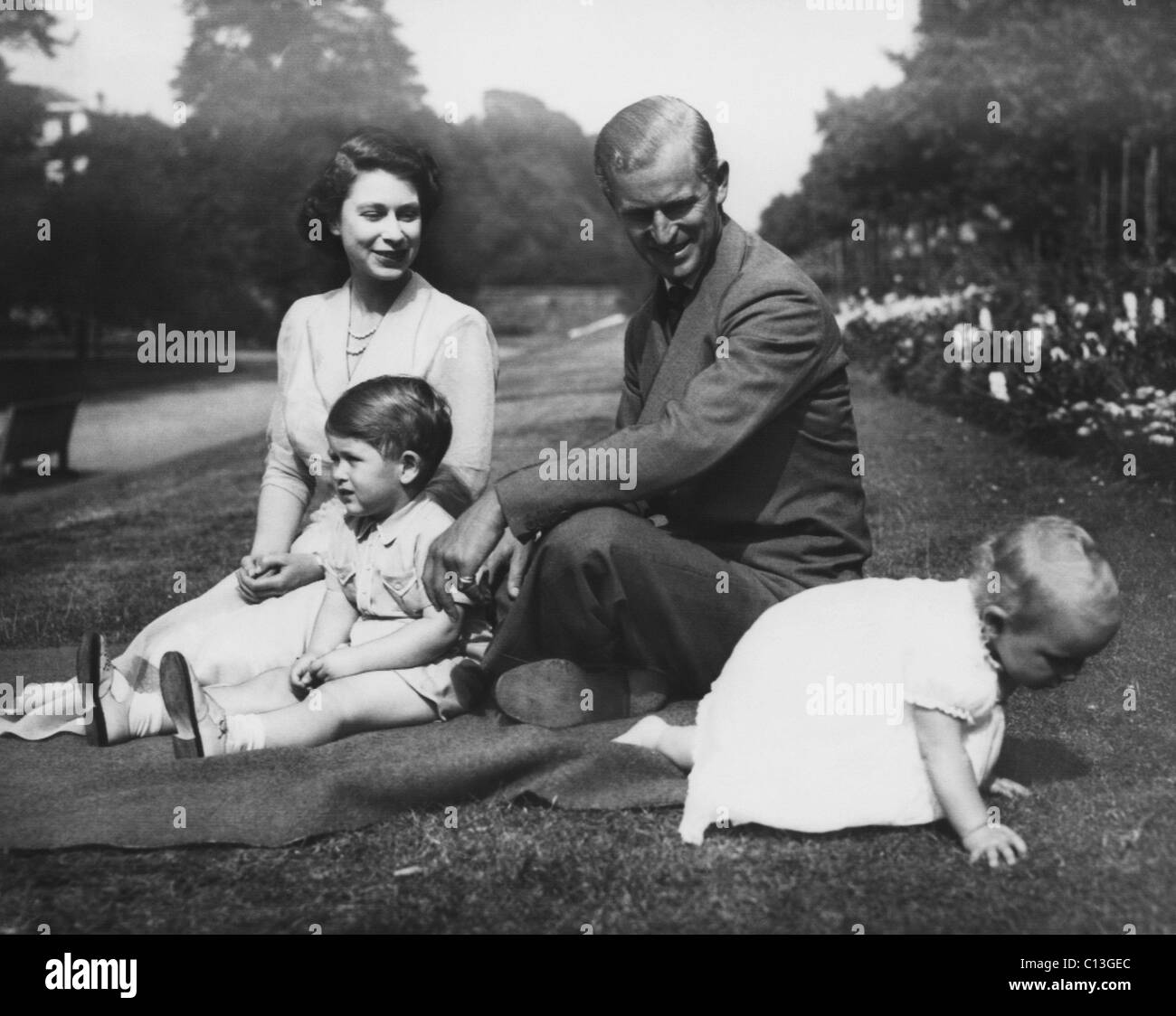 British Royal Family. From left: future Queen of England Princess Elizabeth, future Prince of Wales Prince Charles, Prince Philip, Duke of Edinburgh, future Princess Royal of England Princess Anne, London, England, 1951. Stock Photo