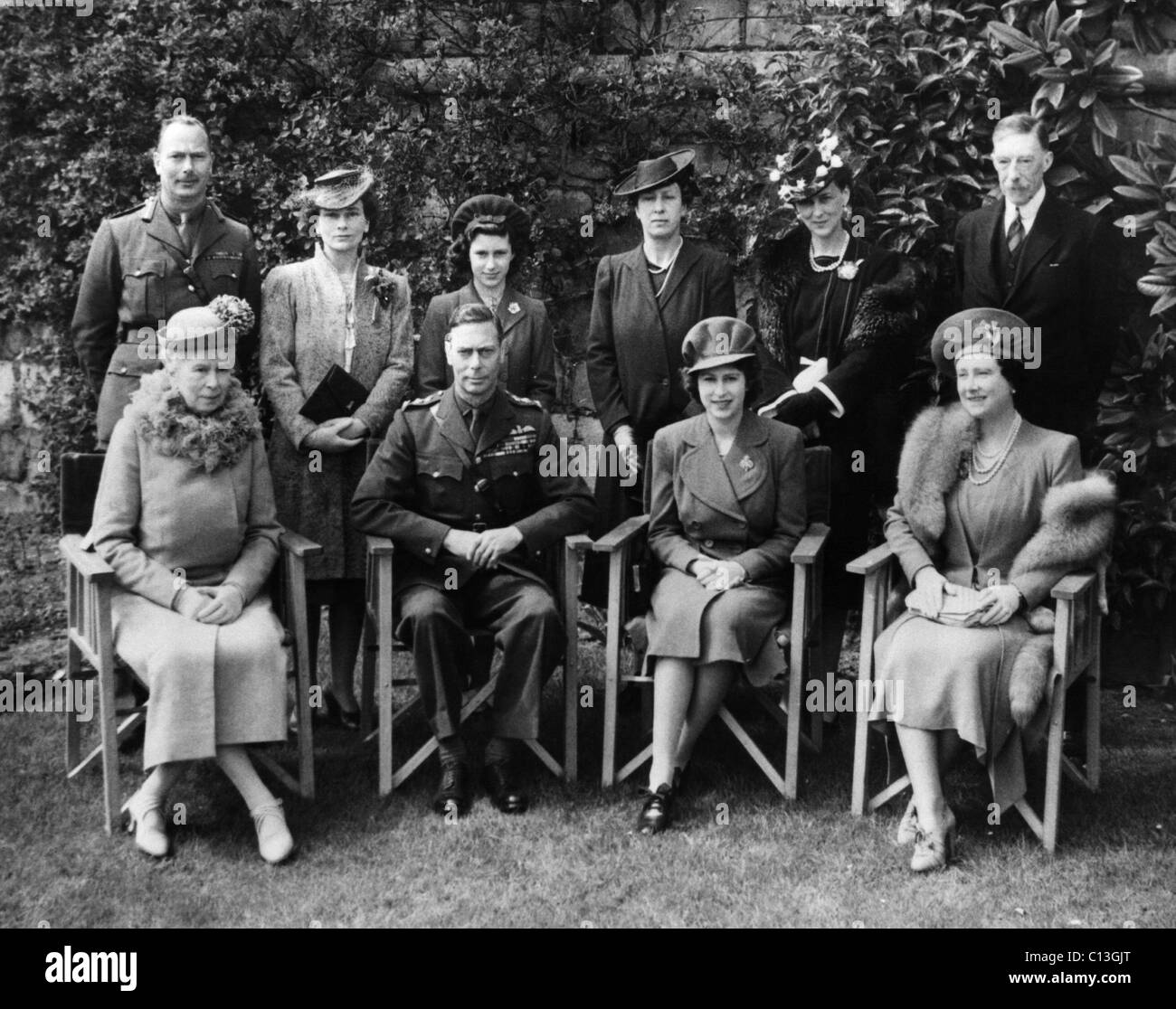 British Royal Family. Seated, from left: Queen Mary, King George VI, Princess Elizabeth, Queen Elizabeth. Standing, from left: Prince Henry, Princess Alice, Princess Margaret, Mary, Princess Royal, Duchess of Gloucester, Princess Marina, Henry Lacelles, on Princess Elizabeth's 18th Birthday, April 21, 1944. Stock Photo