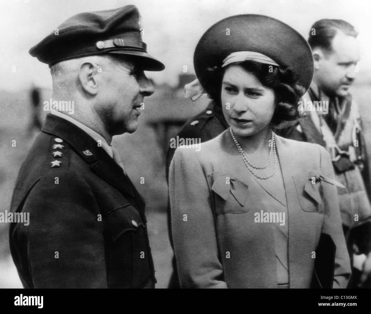 World War II. US Air Force General James Doolittle and future Queen of England Princess Elizabeth, US Bomber Base, England, 1944. Stock Photo