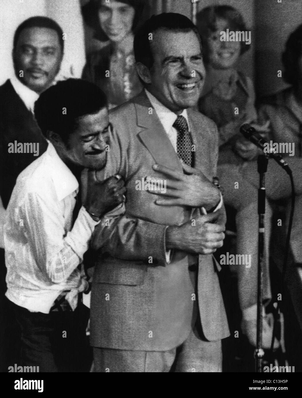 Nixon Presidency. Sammy Davis Jr. embraces US President Richard Nixon