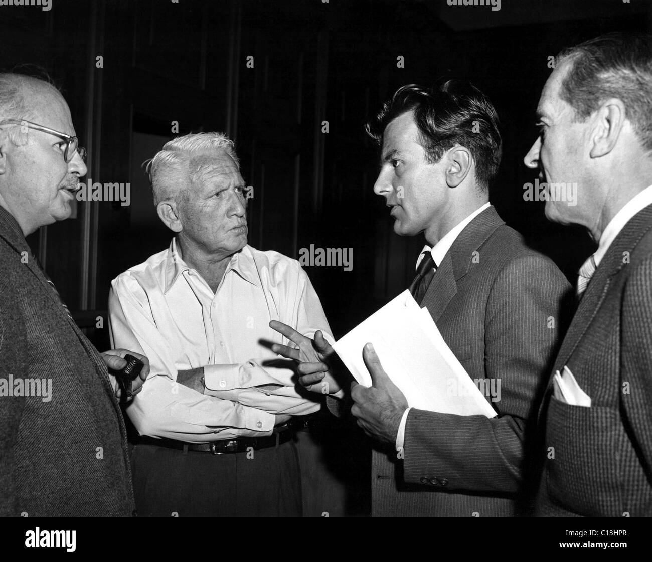 Author WILLIAM L. SHIRER on the set of JUDGMENT AT NUREMBERG with SPENCER TRACY and MAXIMILIAN SCHELL, 6/26/61 Stock Photo