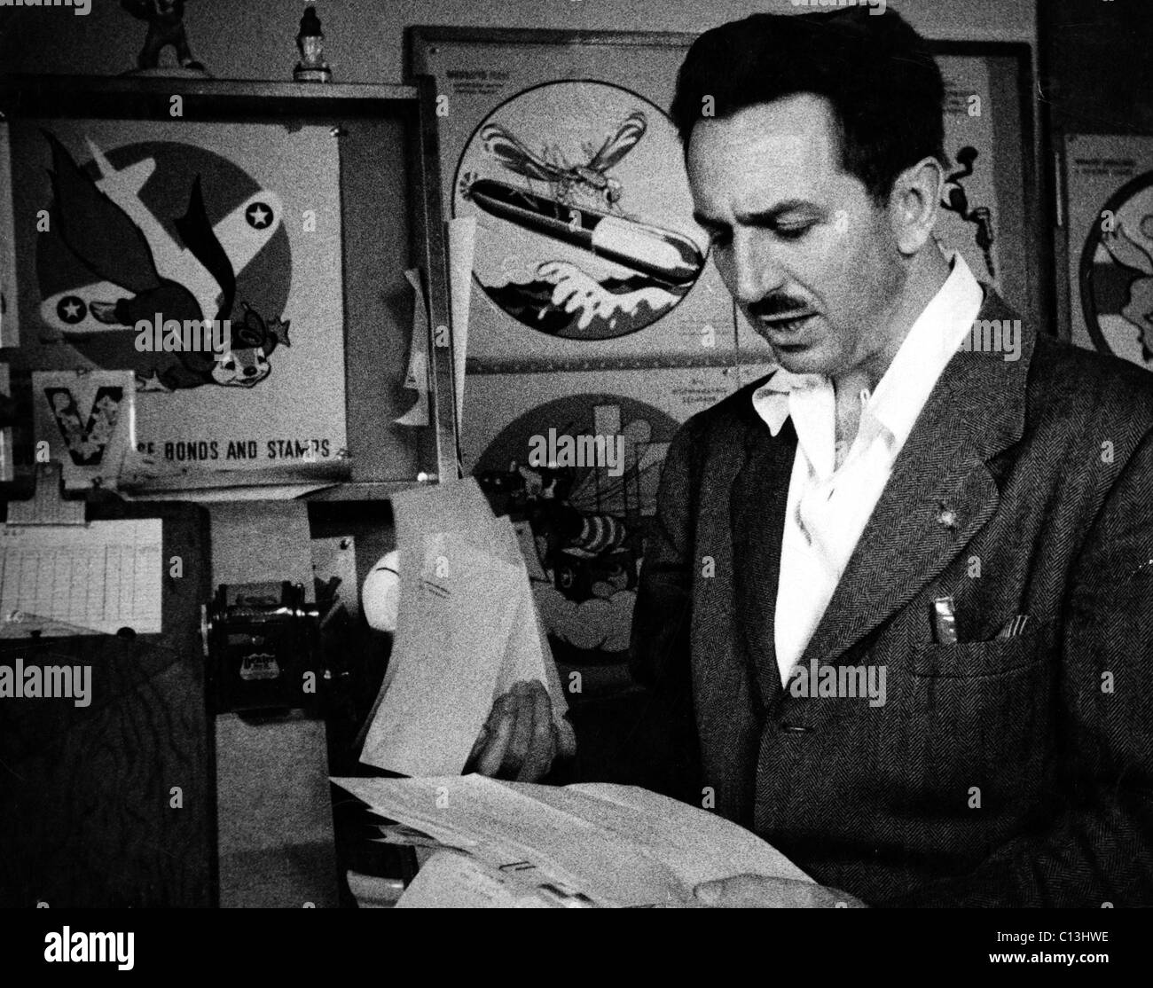 Walt Disney reading mail at the Disney studio in the early 1940s Stock Photo