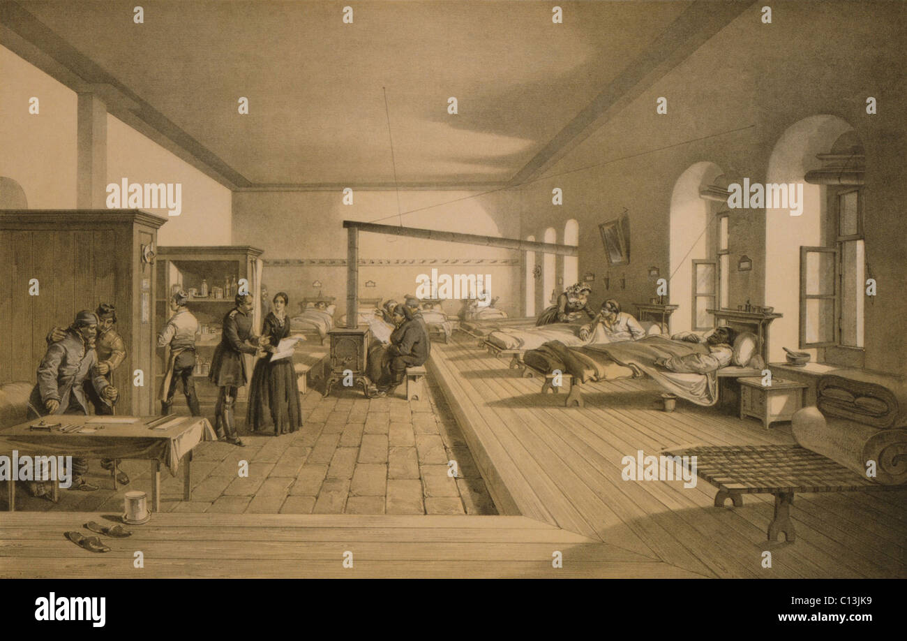 Florence Nightingale (1820-1910), British nurse, in a ward of the hospital at Scutari (across the Bosporus from Istanbul) during the Crimean War. Ward shows the results of her sanitation measures that eliminated overcrowding, and allowed in light and fresh air. Stock Photo