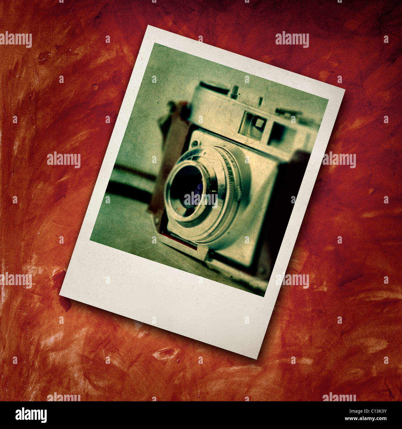 Polaroid frame with a image of a Old fashioned photography camera Stock  Photo - Alamy