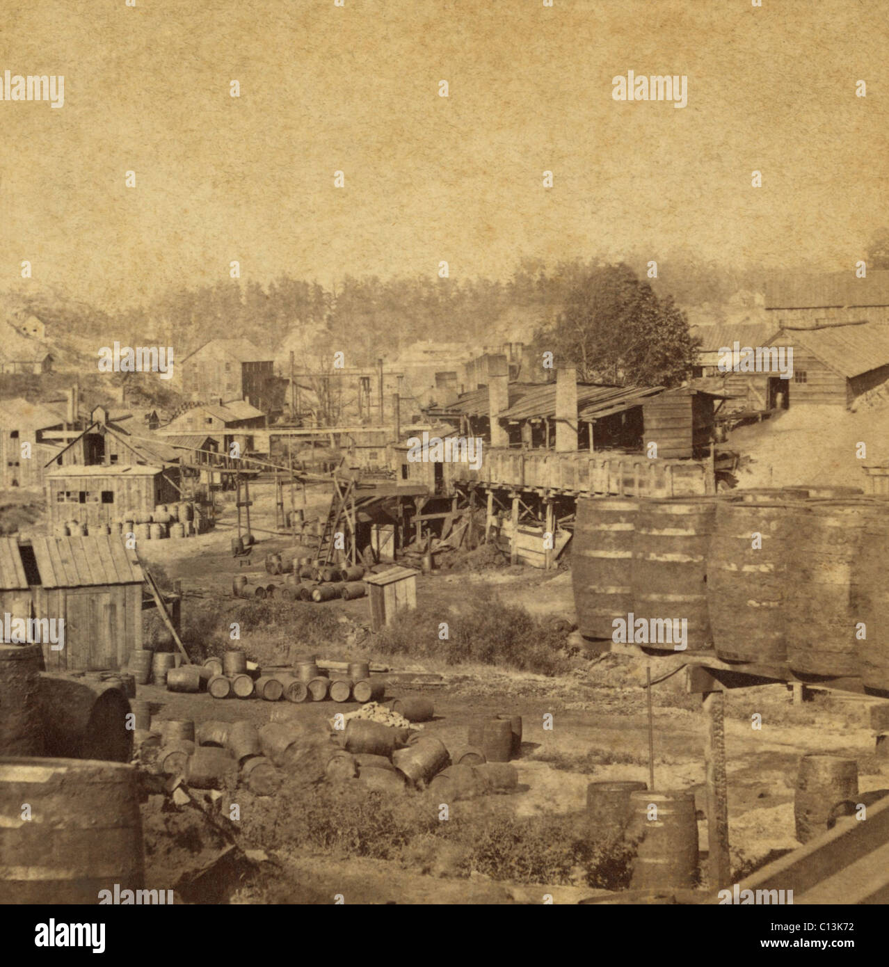 Barrels and buildings at an oil refinery in Erie, Pennsylvania in the