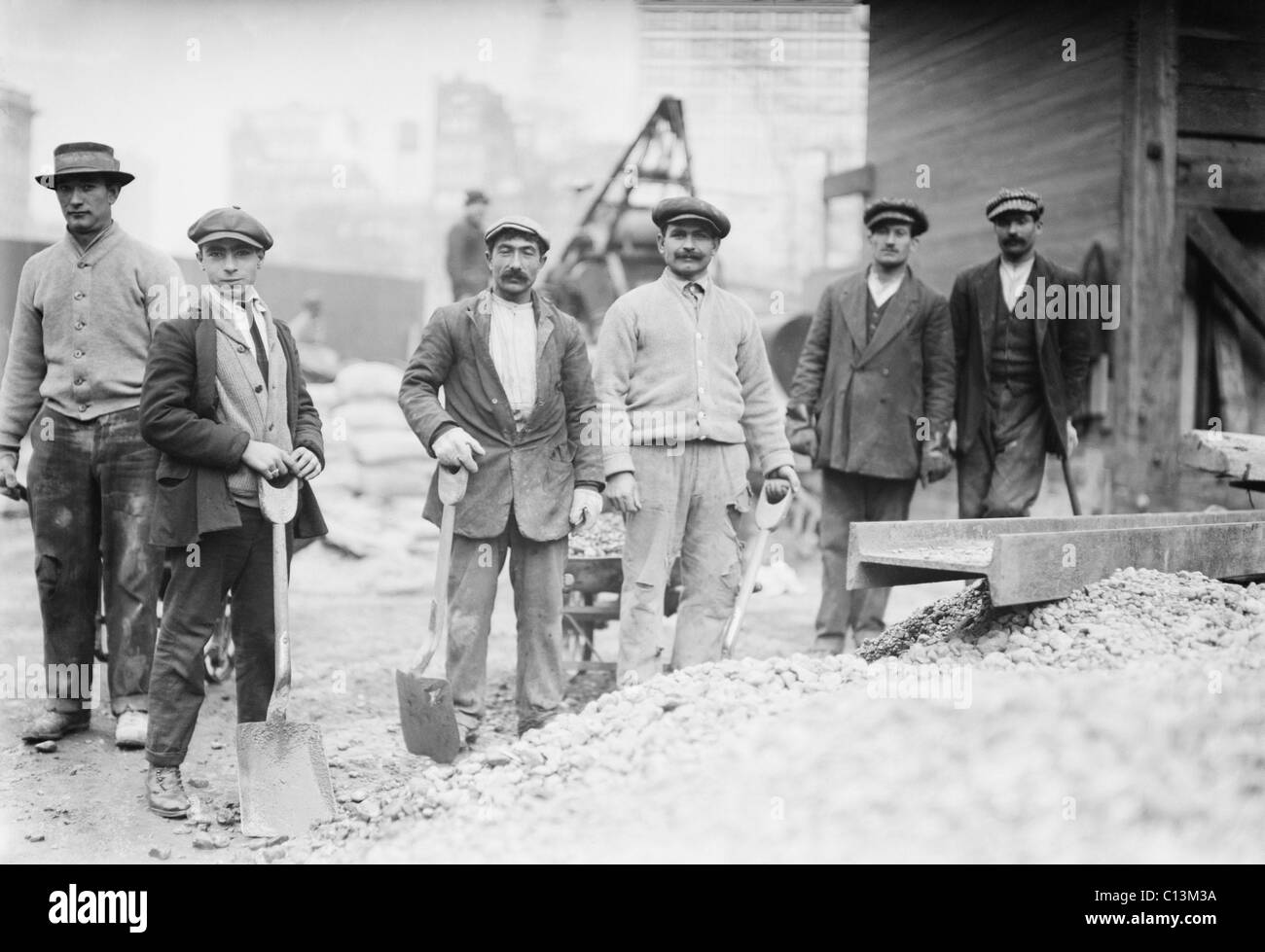 Alien Subway workers with shovels dressed in their street clothing, as they begin work constructing the New York City Subway. Ca. 1910. Stock Photo